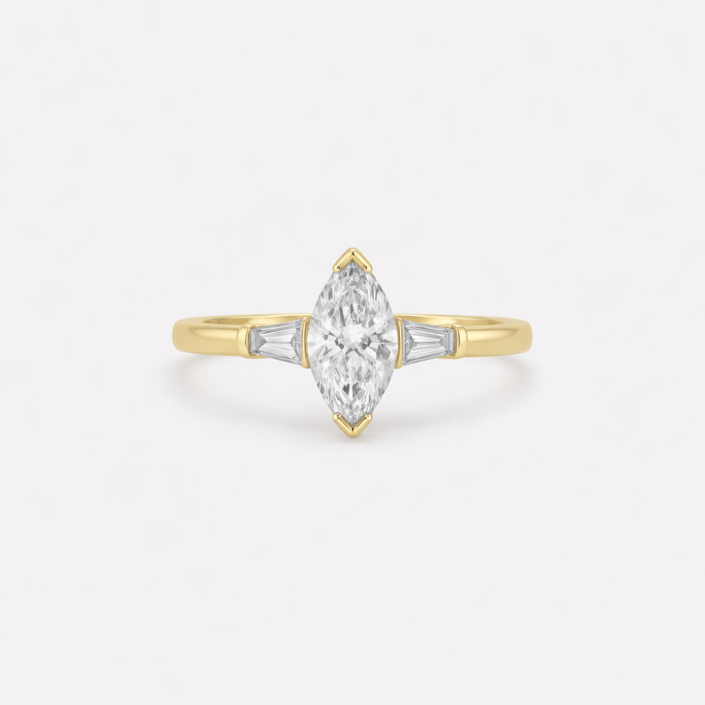Rings-Your perfect art-deco dream. The striking beauty of the marquise diamond is the focus of this stunning engagement ring. The trilogy arrangement with the tapered baguettes on either side of the centre stone creates a crescendo of sparkling beauty. - VIDEO 1- VIDEO 2-ELIISE MAAR JEWELLERY