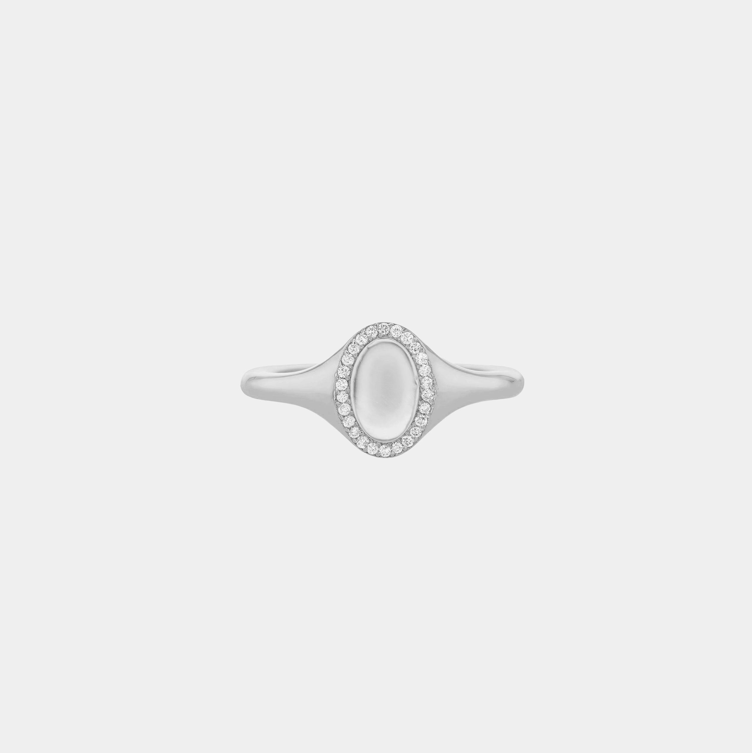 Rings-An elevated take on a classic signet ring. With an antique inspired shape this timeless ring is embellished with a delicate halo of small diamonds around the oval face of the ring.-ELIISE MAAR JEWELLERY