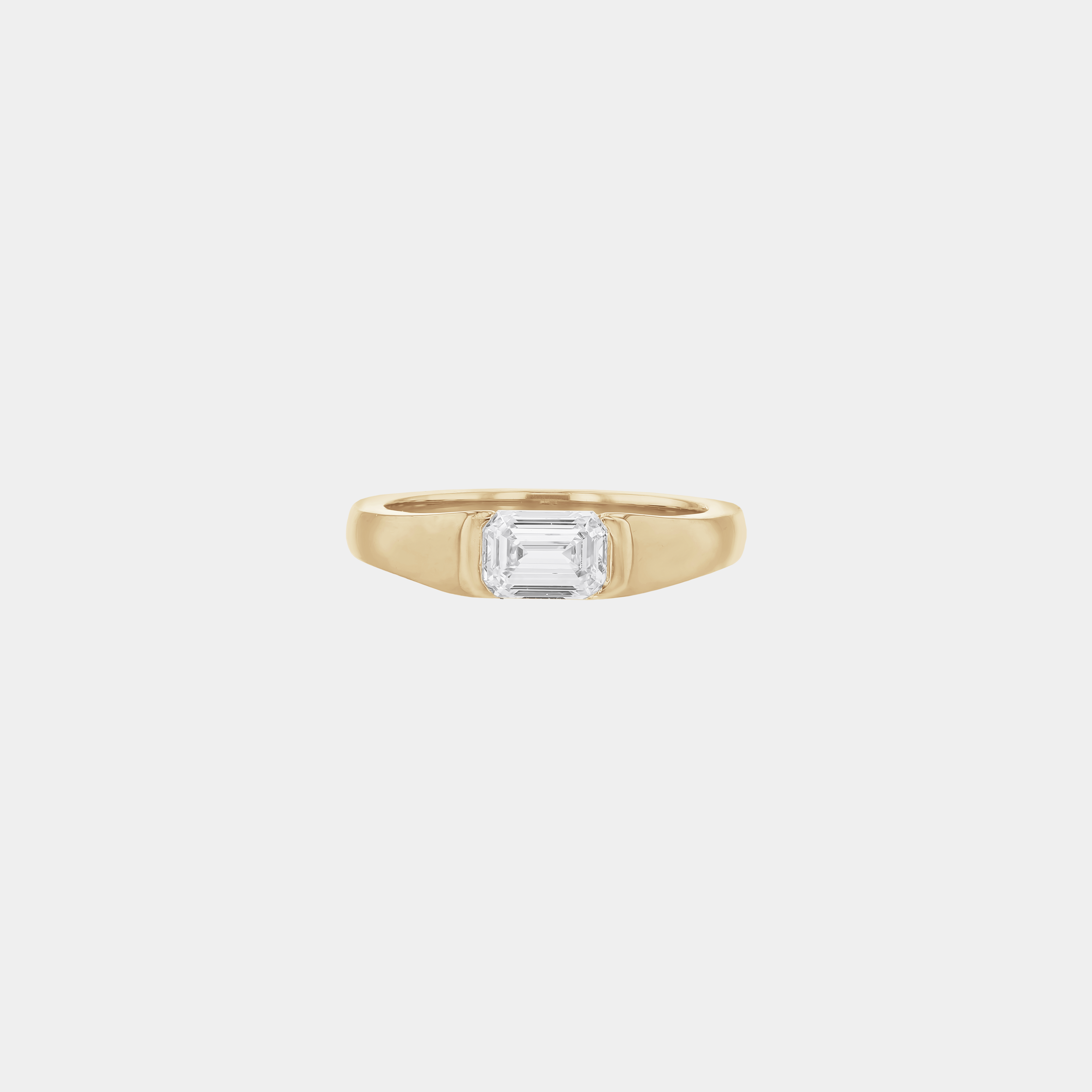 Rings-A modern and elegant signet band. Featuring an east-west half bezel set emerald cut diamond. This ring is the perfect understated engagement ring or striking signet band. Pair with the Petite Nadia Diamond Band for an elevated wedding set.-ELIISE MAAR JEWELLERY