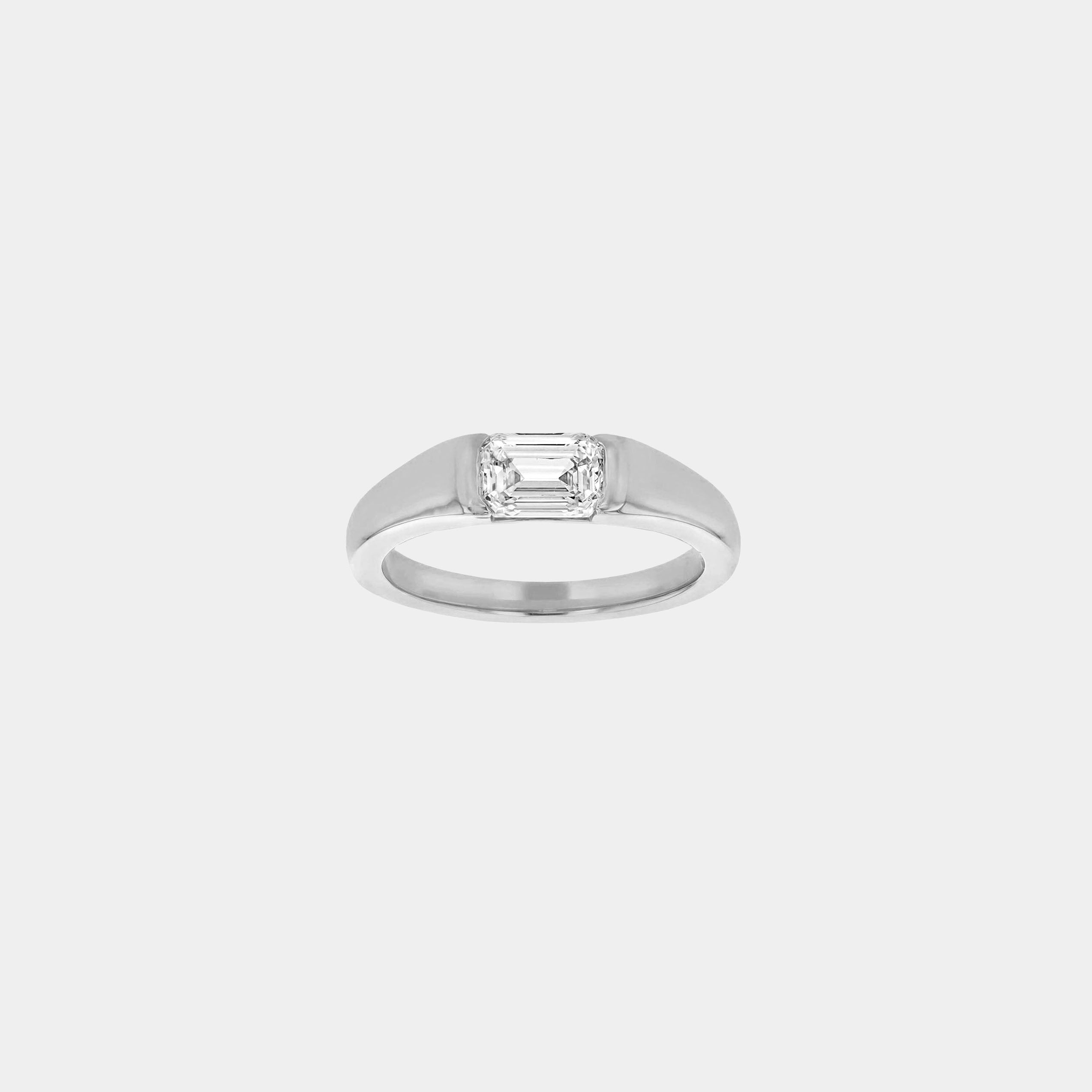 Rings-A modern and elegant signet band. Featuring an east-west half bezel set emerald cut diamond. This ring is the perfect understated engagement ring or striking signet band. Pair with the Petite Nadia Diamond Band for an elevated wedding set.-ELIISE MAAR JEWELLERY