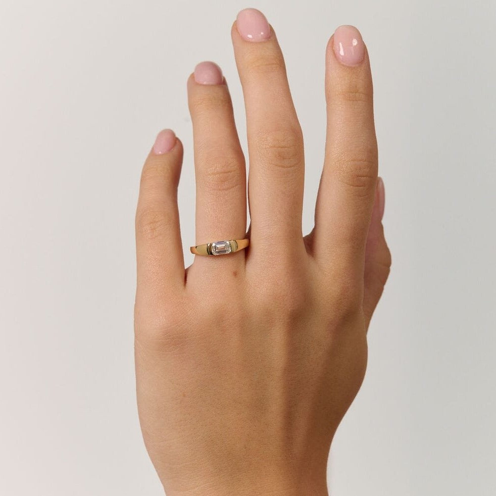 Rings-A modern and elegant signet band. Featuring an east-west half bezel set emerald cut diamond. This ring is the perfect understated engagement ring or striking signet band. Pair with the Petite Nadia Diamond Band for an elevated wedding set.-ELIISE MAAR JEWELLERY