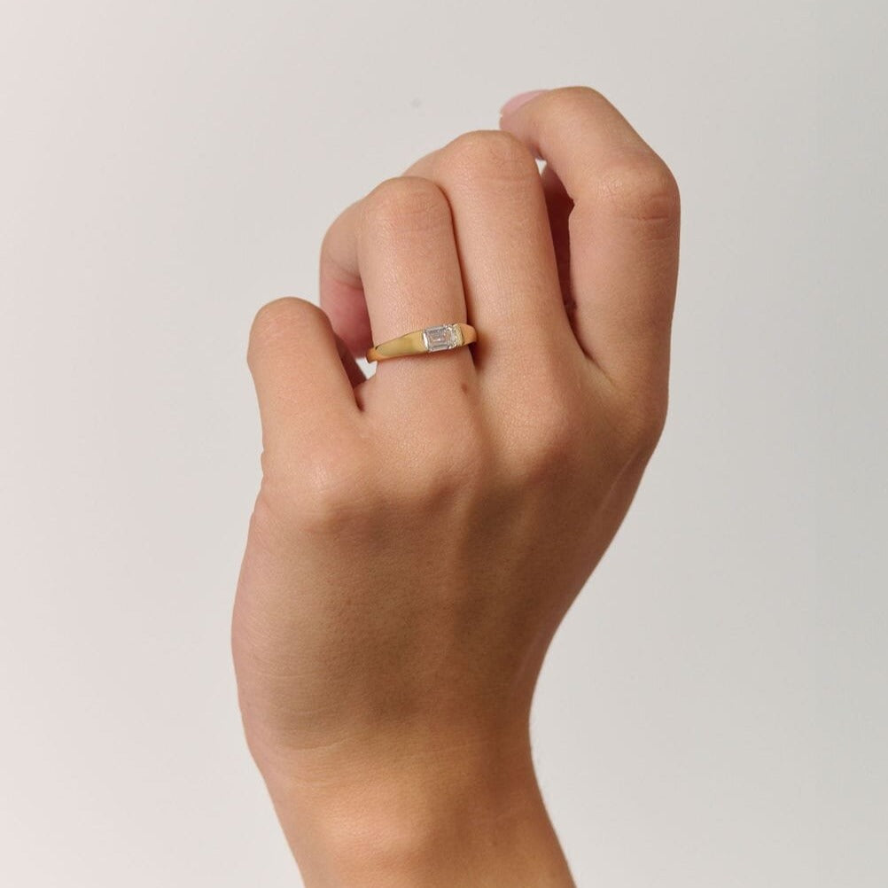 Rings-A modern and elegant signet band. Featuring an east-west half bezel set emerald cut diamond. This ring is the perfect understated engagement ring or striking signet band. Pair with the Petite Nadia Diamond Band for an elevated wedding set.-ELIISE MAAR JEWELLERY