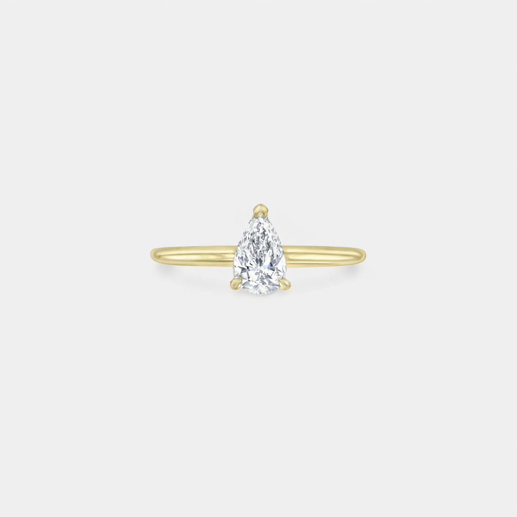 Rings-A classic solitaire design featuring a pear cut diamond. *Available in various diamond sizes.-ELIISE MAAR JEWELLERY