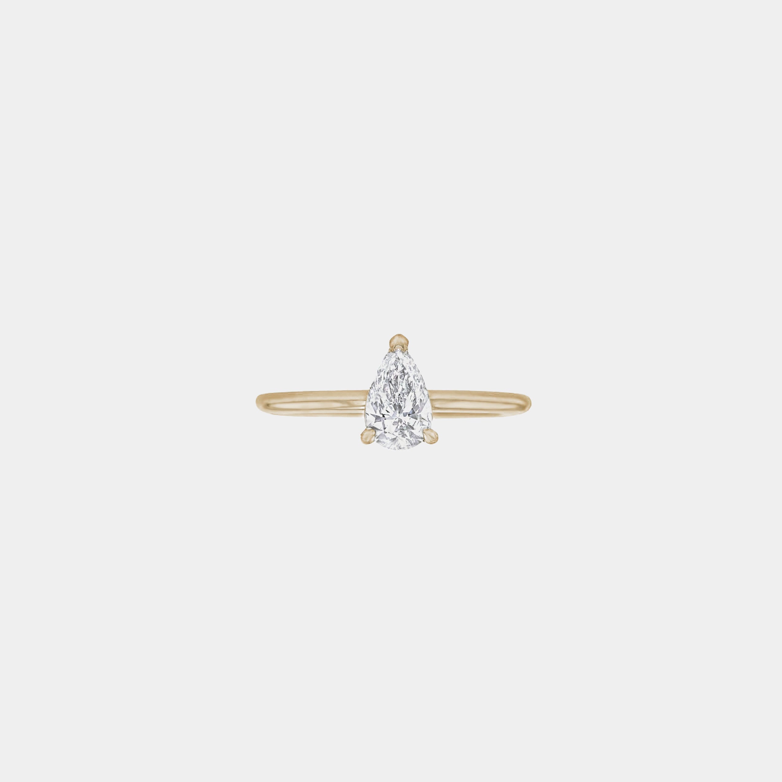 Rings-A classic solitaire design featuring a pear cut diamond. *Available in various diamond sizes.-ELIISE MAAR JEWELLERY