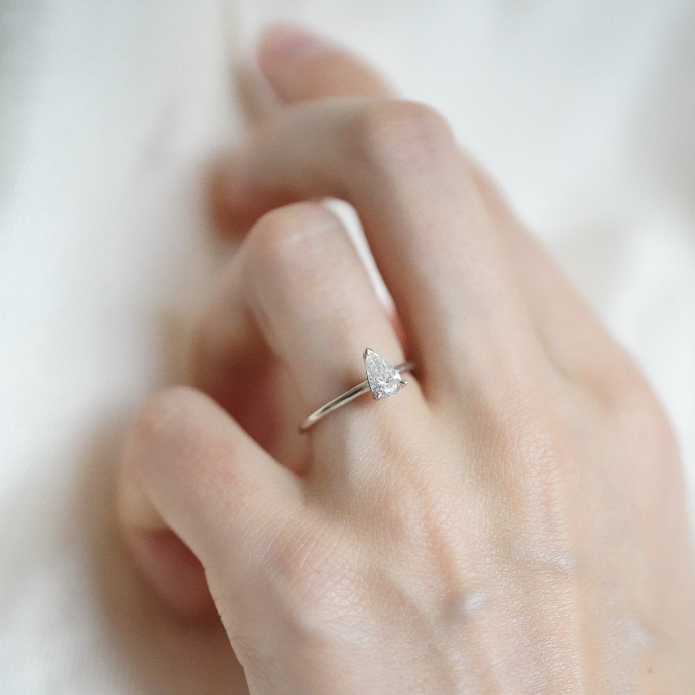 Rings-A classic solitaire design featuring a pear cut diamond. *Available in various diamond sizes.-ELIISE MAAR JEWELLERY