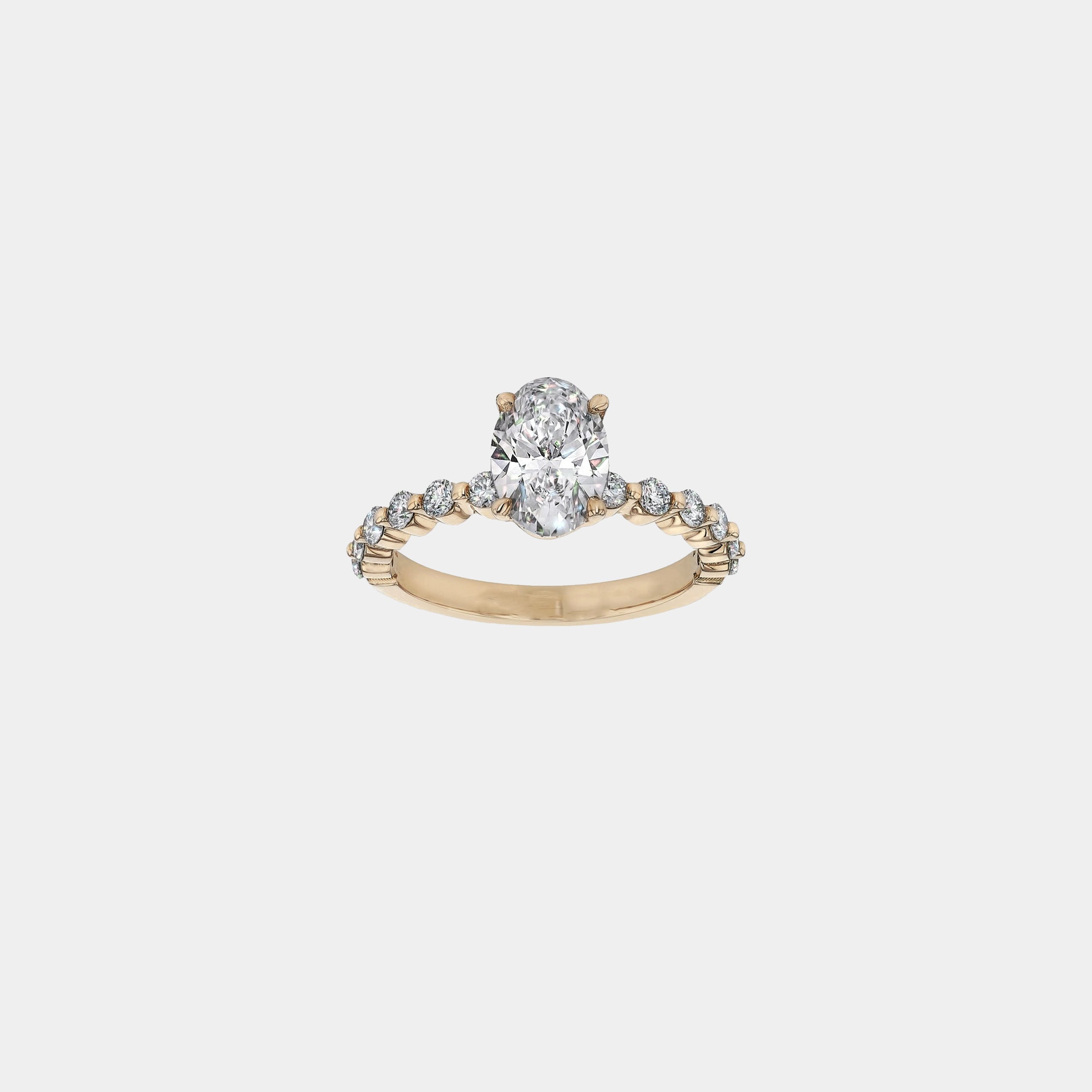 Rings-Exemplify the beauty of the oval cut diamond with the beautiful round brilliant cut diamonds set into the band of this ring. A truly stunning ring to love for a lifetime. Pair with the Petite Josephine or Josephine Luxe for a matching wedding set.-ELIISE MAAR JEWELLERY