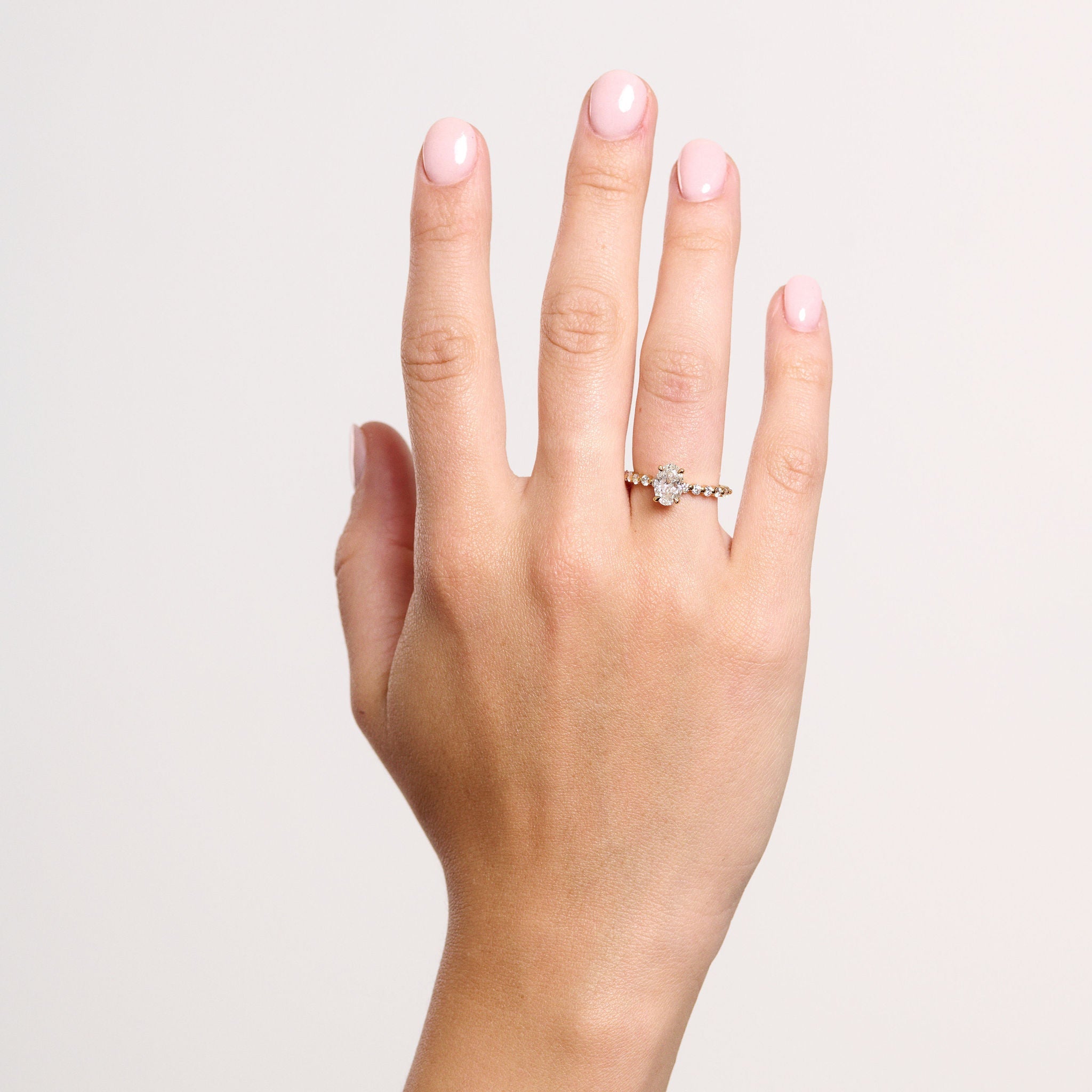 Rings-Exemplify the beauty of the oval cut diamond with the beautiful round brilliant cut diamonds set into the band of this ring. A truly stunning ring to love for a lifetime. Pair with the Petite Josephine or Josephine Luxe for a matching wedding set.-ELIISE MAAR JEWELLERY