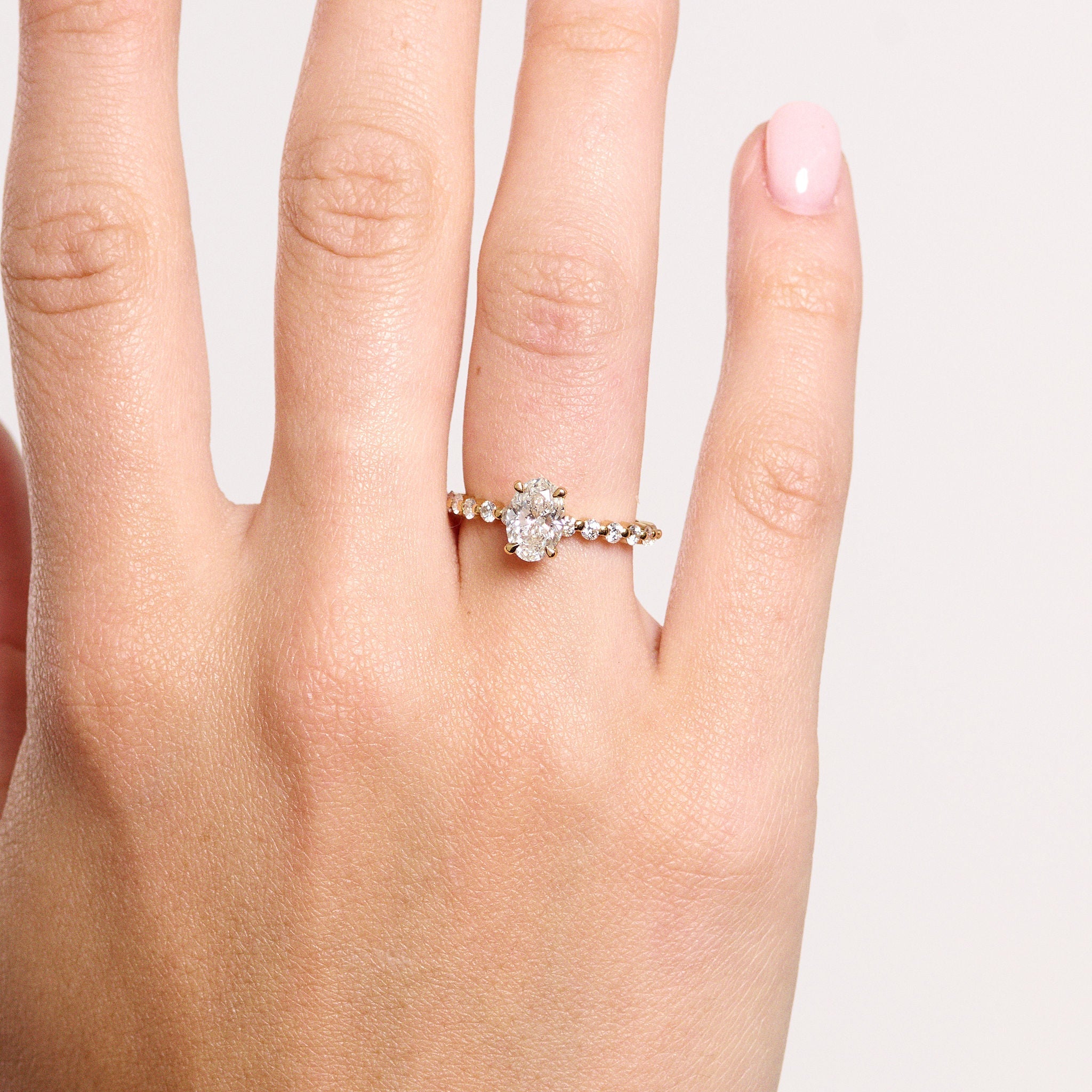 Rings-Exemplify the beauty of the oval cut diamond with the beautiful round brilliant cut diamonds set into the band of this ring. A truly stunning ring to love for a lifetime. Pair with the Petite Josephine or Josephine Luxe for a matching wedding set.-ELIISE MAAR JEWELLERY