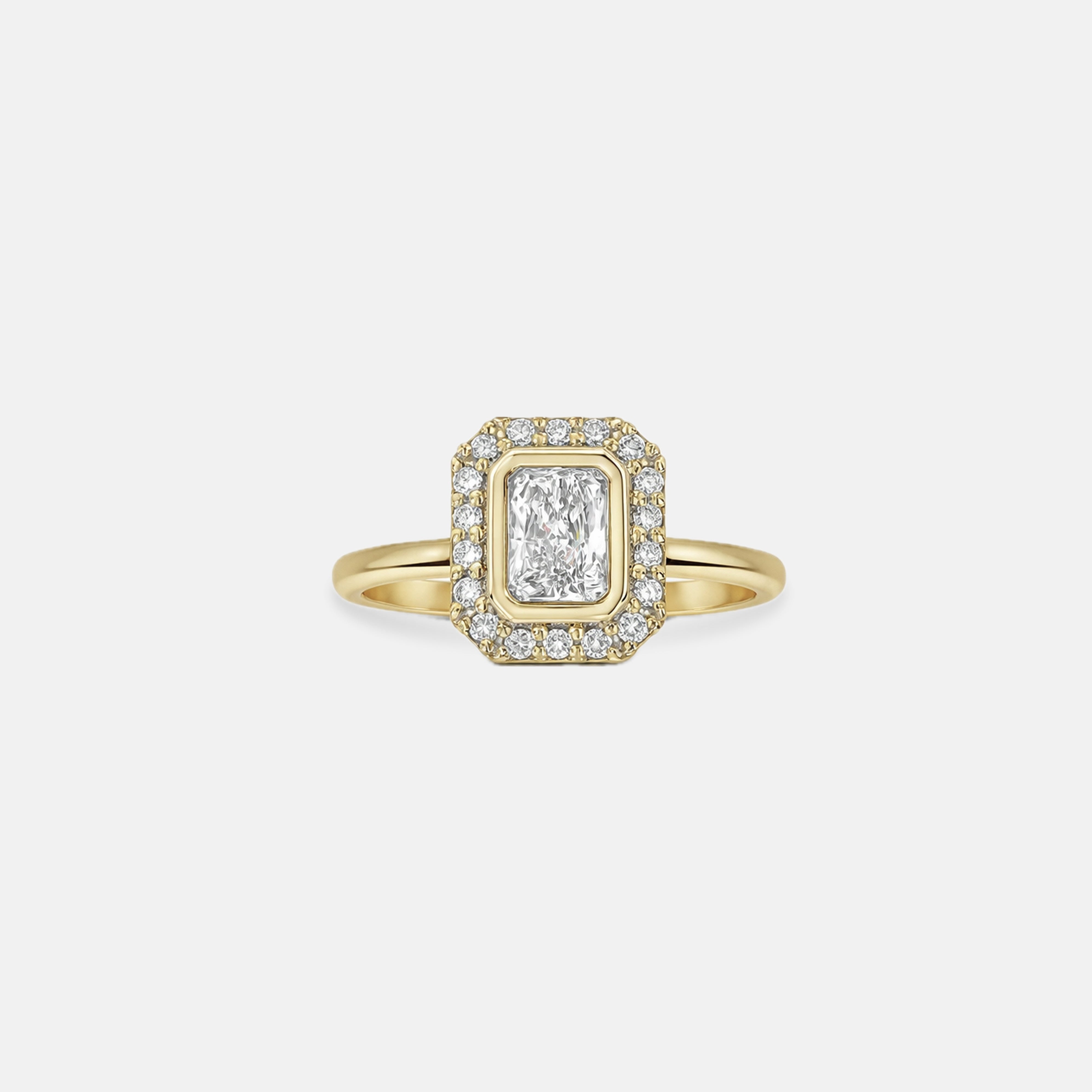Rings-A contemporary take on an art-deco design. The Holly boasts a stunning bezel set radiant cut centre diamond adorned by a striking halo. This ring uses and enhances the metal in which the stones are set in to create a design that is powerful and elegant.-ELIISE MAAR JEWELLERY