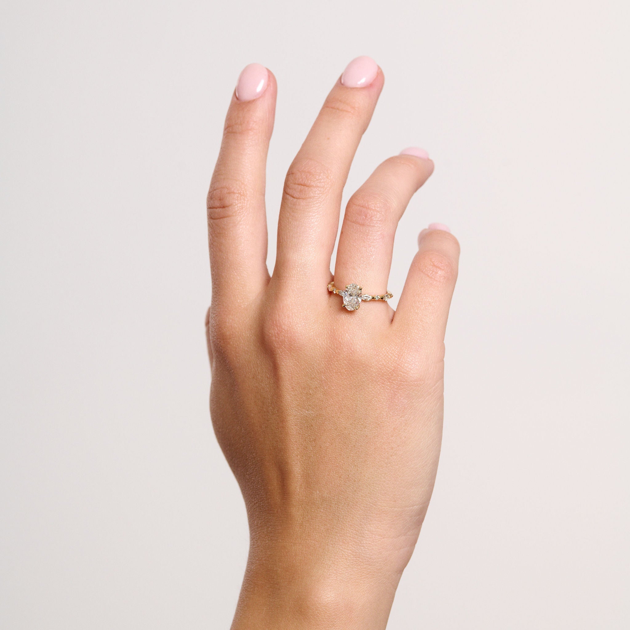 Rings-Our most classic Eliise Maar Design. With striking round brilliant and marquise cut diamonds set into the band in a dazzling wave of brilliance creating a crescendo at the centre stone of your choosing. This ring is feminine and mesmerising.-ELIISE MAAR JEWELLERY