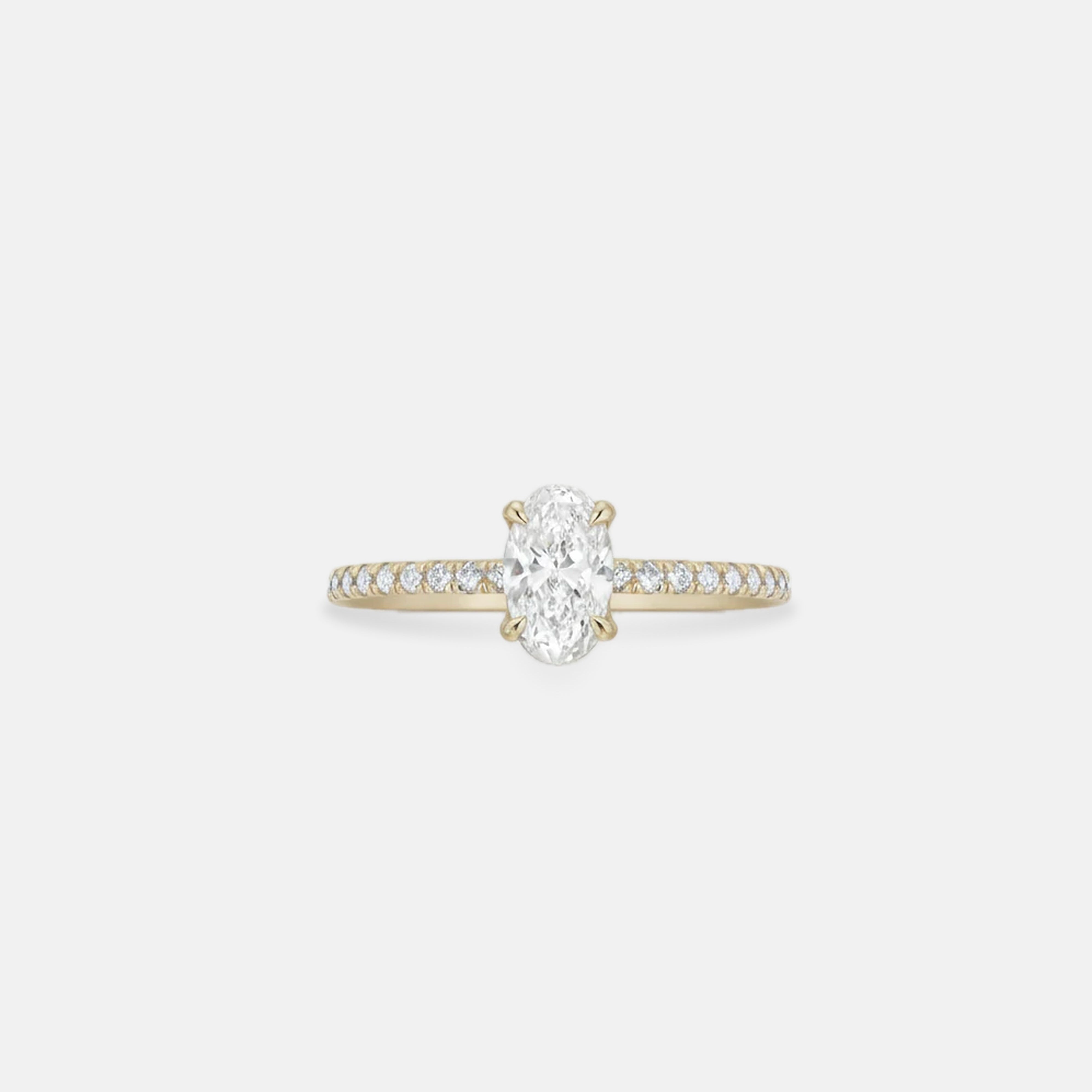 Rings-A elegant engagement ring with a beautiful half eternity pavé diamond band. The striking fire of the side diamonds enhance the brilliance of the oval cut centre diamond. Pair the Lena with with Fine Lavish diamond band for a matching set. Available with an oval or pear shaped diamond.-ELIISE MAAR JEWELLERY