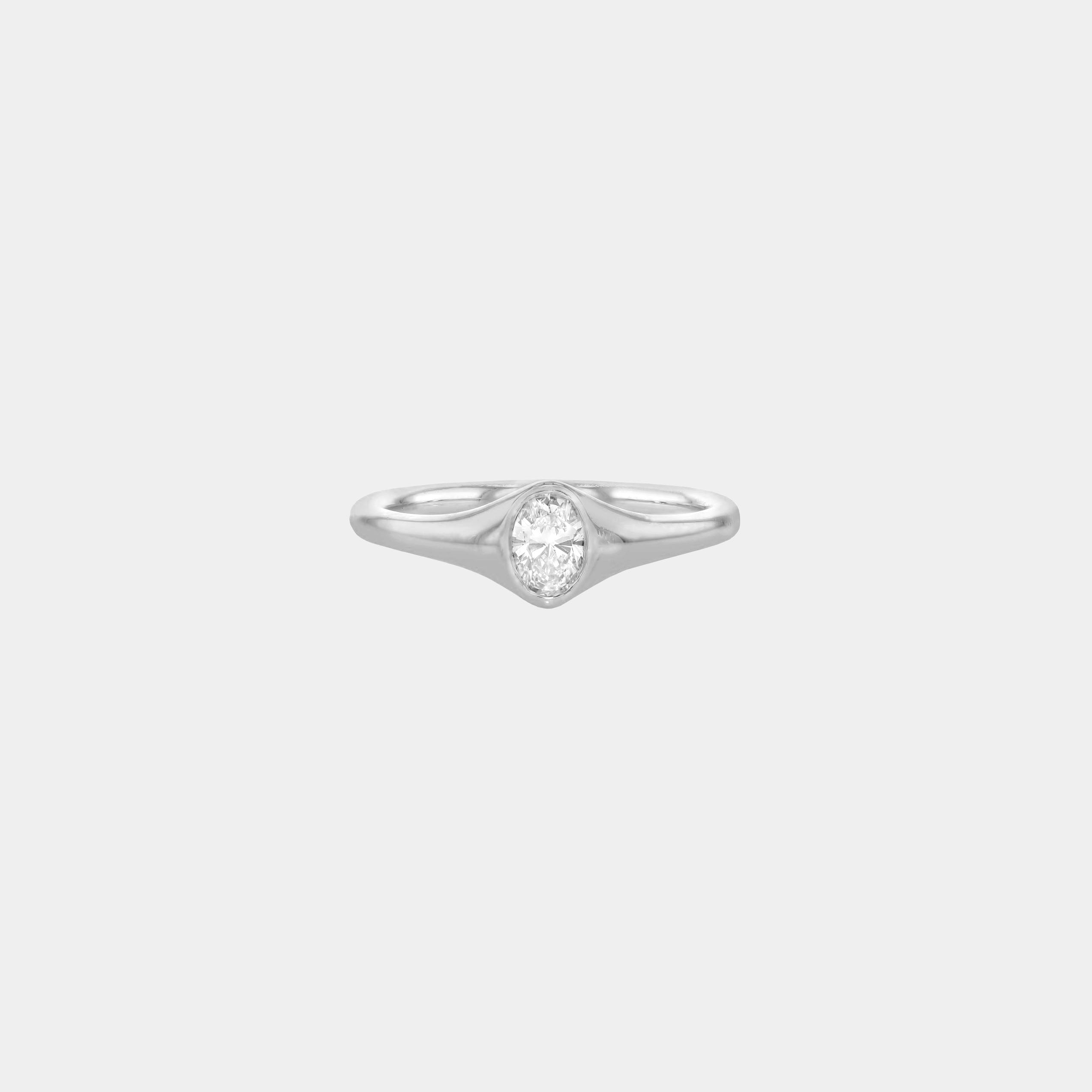 Rings-An exquisitely dainty signet band. Set with an oval diamond, this signet is perfect as a pinky ring or tasteful ring on any finger. Stunning by itself or paired with the Staple Signet Diamond Band for extra elegance. Matching Staple Signet diamond band is available to purchase separately here-ELIISE MAAR JEWELLERY