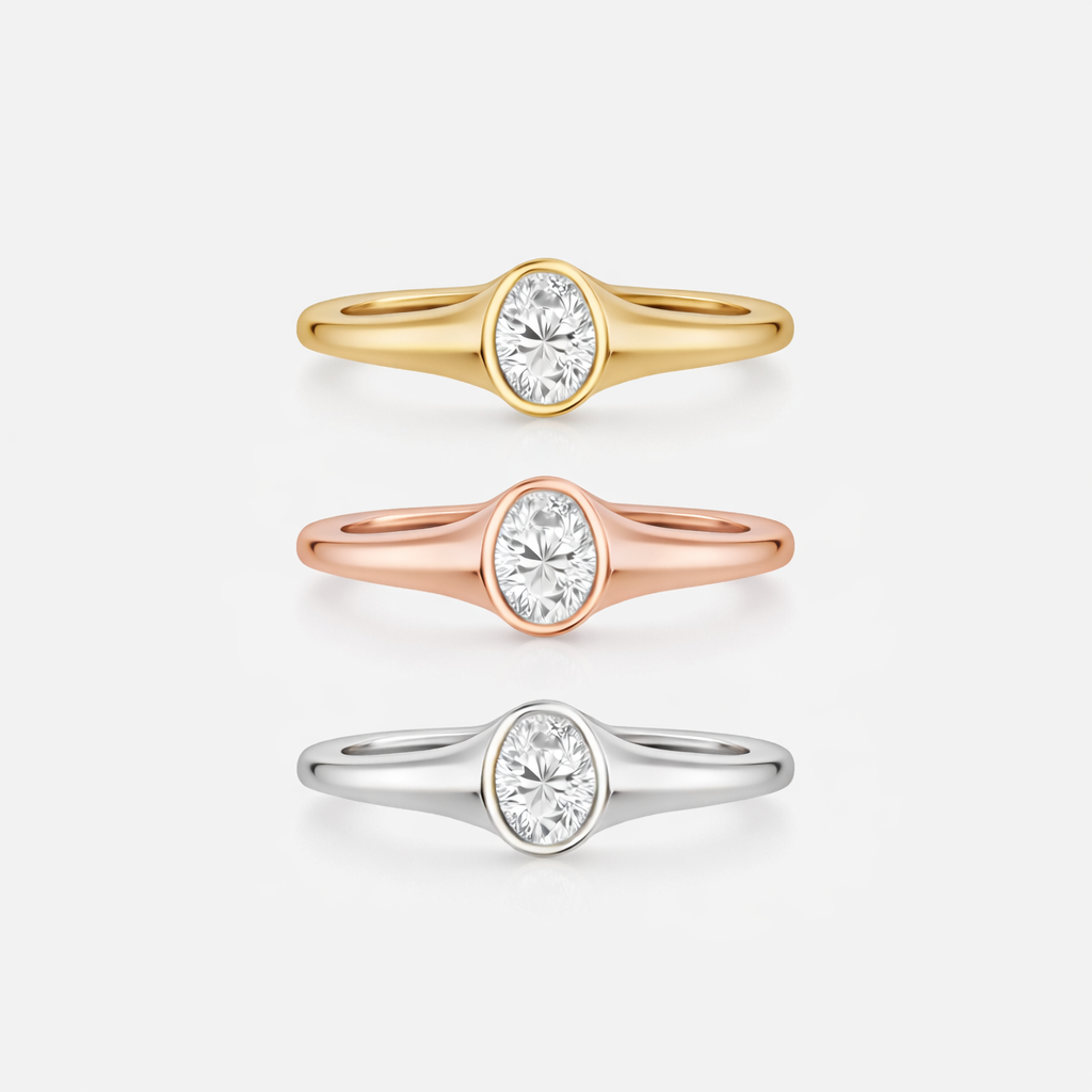 Rings-An exquisitely dainty signet band. Set with an oval diamond, this signet is perfect as a pinky ring or tasteful ring on any finger. Stunning by itself or paired with the Staple Signet Diamond Band for extra elegance. Matching Staple Signet diamond band is available to purchase separately here-ELIISE MAAR JEWELLERY