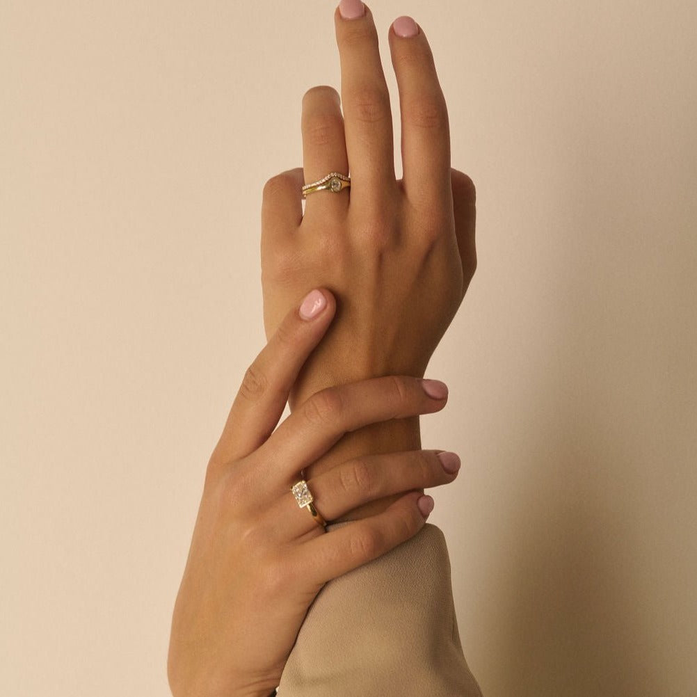 Rings-An exquisitely dainty signet band. Set with an oval diamond, this signet is perfect as a pinky ring or tasteful ring on any finger. Stunning by itself or paired with the Staple Signet Diamond Band for extra elegance. Matching Staple Signet diamond band is available to purchase separately here-ELIISE MAAR JEWELLERY