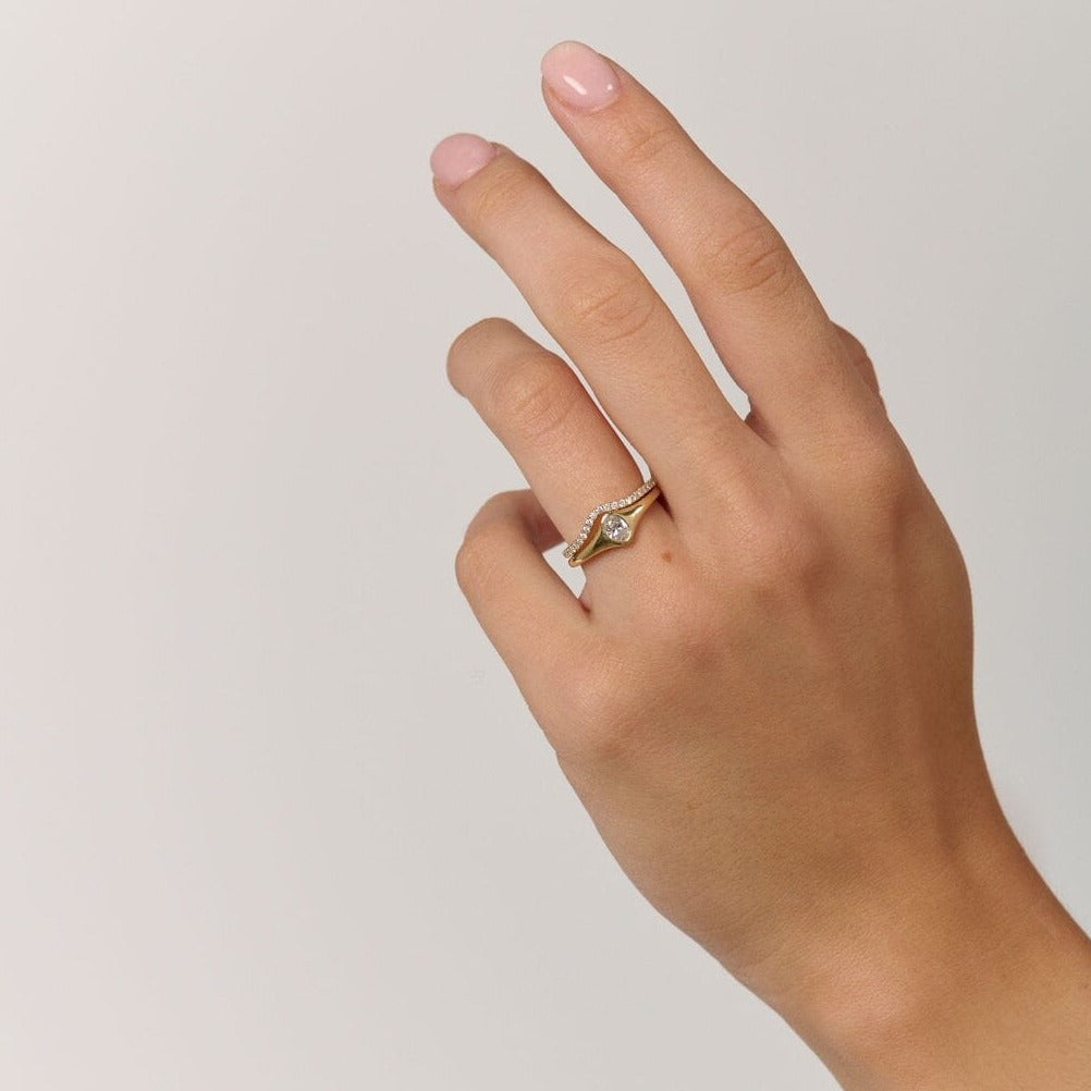 Rings-An exquisitely dainty signet band. Set with an oval diamond, this signet is perfect as a pinky ring or tasteful ring on any finger. Stunning by itself or paired with the Staple Signet Diamond Band for extra elegance. Matching Staple Signet diamond band is available to purchase separately here-ELIISE MAAR JEWELLERY
