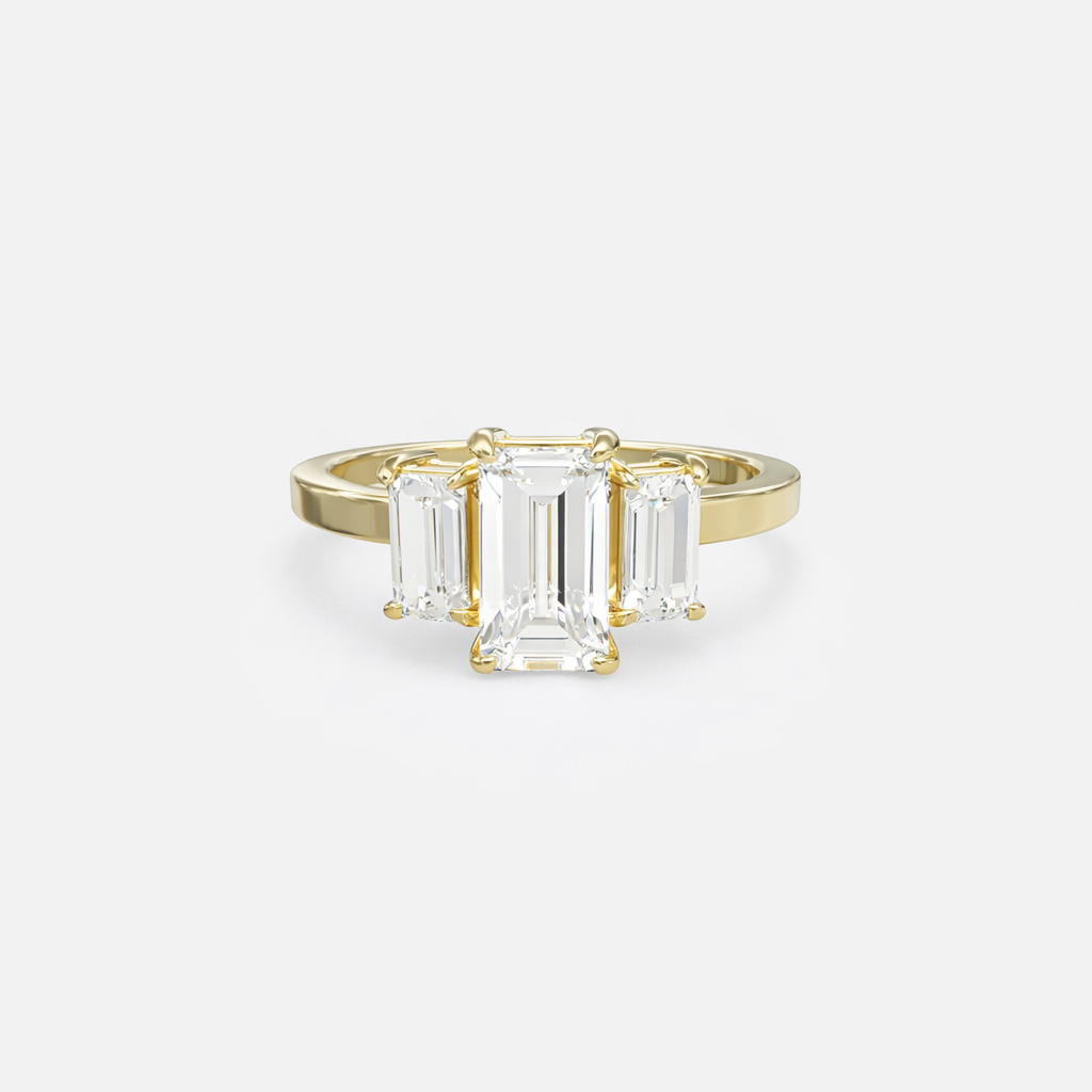 Rings-The Polly Baguette Trilogy is a celebration of clarity, balance, and the unspoken power of presence. At its core, a vertical emerald-cut center stone rises with intention - accompanied by twin baguette-cut sentinels, each aligned in quiet harmony. This triad of precision-cut gems evokes equilibrium and purpose: a sacred geometry of self-alignment, of inner light held steady. The diamonds are set in graceful claws, their sharp symmetry softened by the warmth of a polished finish. Every line, every face