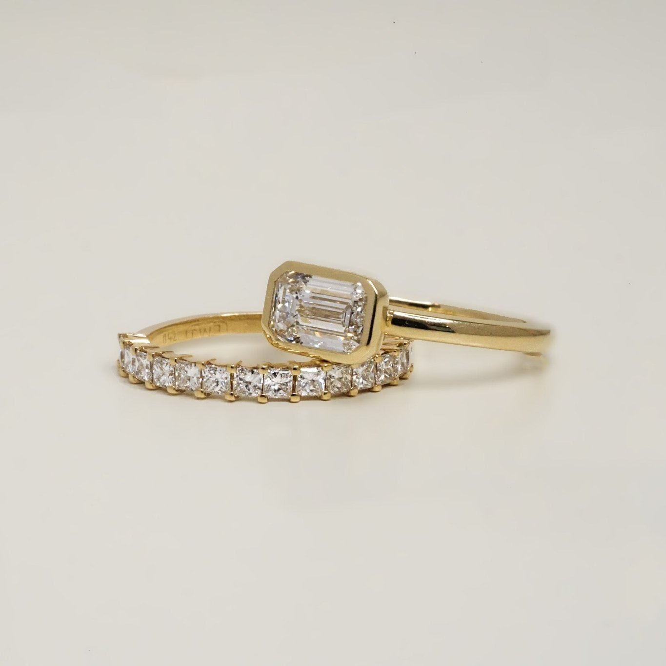 Rings-The Stephanie is truly effortless and timeless. The full bezel setting around the emerald cut diamond makes this ring unique and bold. Fall in love forever with this stunning design.-ELIISE MAAR JEWELLERY