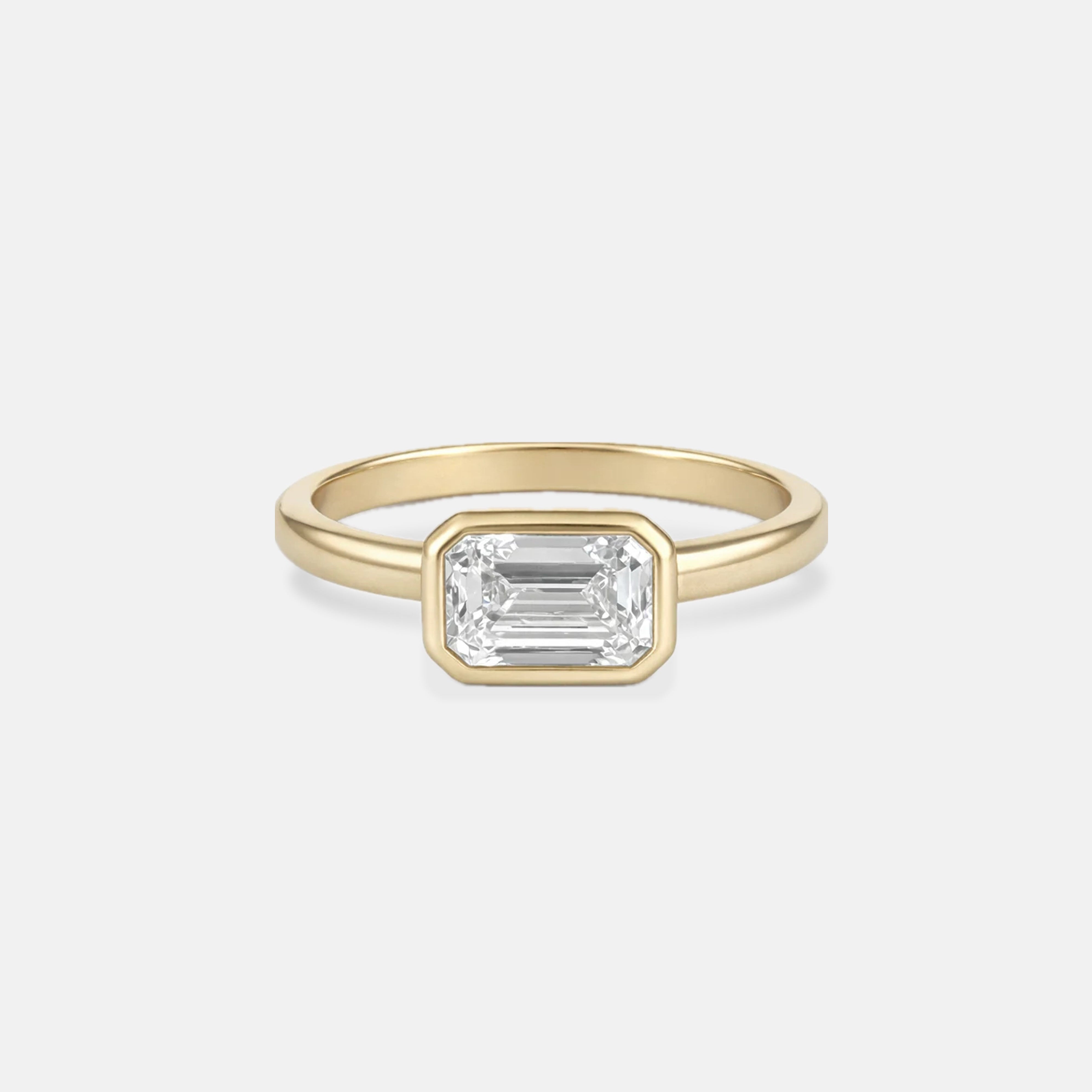 Rings-The Stephanie is truly effortless and timeless. The full bezel setting around the emerald cut diamond makes this ring unique and bold. Fall in love forever with this stunning design.-ELIISE MAAR JEWELLERY