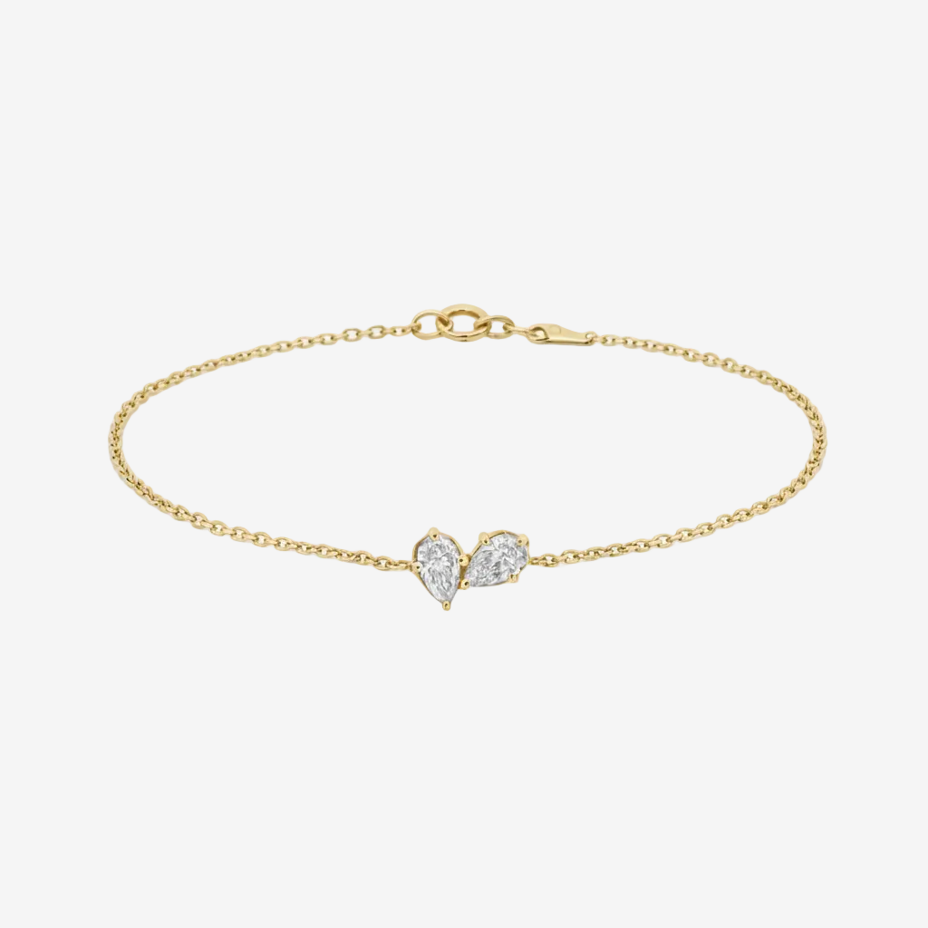 Bracelets-This enchanting heart shaped birthstone necklace looks like a spark of celestial beauty. Two individual, sparkling pear-shaped stones, customizable to each of your beloved's birth months. Luxe Necklace - Features 6x4 Pear Cut Gemstones (total carat weigh 1.00ct) JANUARY Garnet FEBRUARY Amethyst MARCH Aquamarine APRIL Diamond MAY Emerald JUNE Pearl JULY Ruby AUGUST Peridot SEPTEMBER Sapphire OCTOBER Tourmaline NOVEMBER Citrine DECEMBER Blue Topaz Whether worn as a reminder of someone special in you