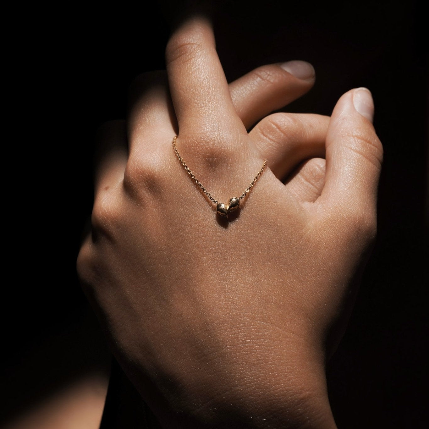 Necklaces-This enchanting heart shaped birthstone necklace looks like a spark of celestial beauty. Two individual, sparkling pear-shaped stones, customizable to each of your beloved's birth months. Luxe Bracelet - Features 6x4 Pear Cut Gemstones (total carat weigh 1.00ct) JANUARY Garnet FEBRUARY Amethyst MARCH Aquamarine APRIL Diamond MAY Emerald JUNE Pearl JULY Ruby AUGUST Peridot SEPTEMBER Sapphire OCTOBER Tourmaline NOVEMBER Citrine DECEMBER Blue Topaz Whether worn as a reminder of someone special in you