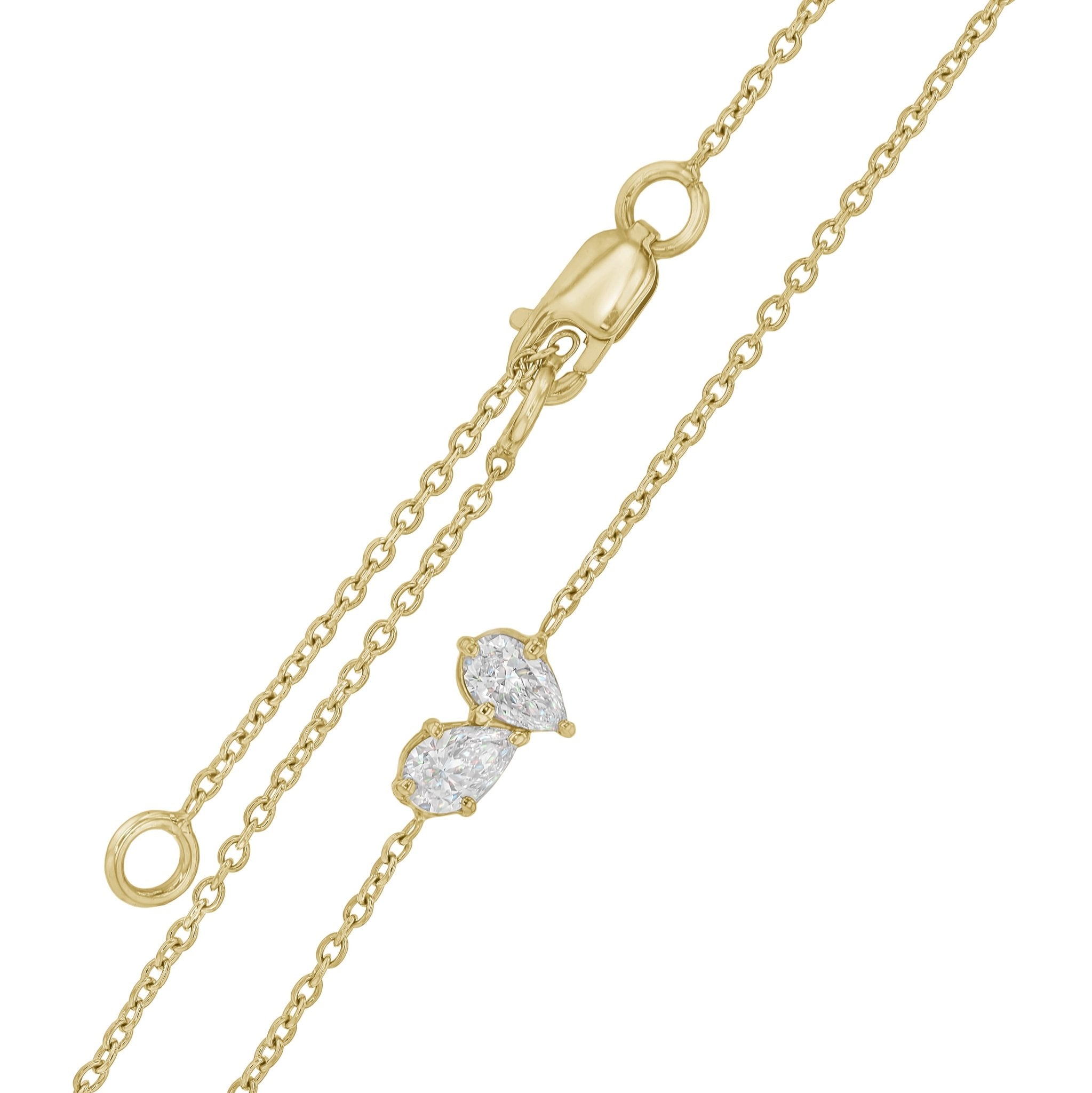 Necklaces-This enchanting heart shaped birthstone necklace looks like a spark of celestial beauty. Two individual, sparkling pear-shaped stones, customizable to each of your beloved's birth months. Luxe Bracelet - Features 6x4 Pear Cut Gemstones (total carat weigh 1.00ct) JANUARY Garnet FEBRUARY Amethyst MARCH Aquamarine APRIL Diamond MAY Emerald JUNE Pearl JULY Ruby AUGUST Peridot SEPTEMBER Sapphire OCTOBER Tourmaline NOVEMBER Citrine DECEMBER Blue Topaz Whether worn as a reminder of someone special in you