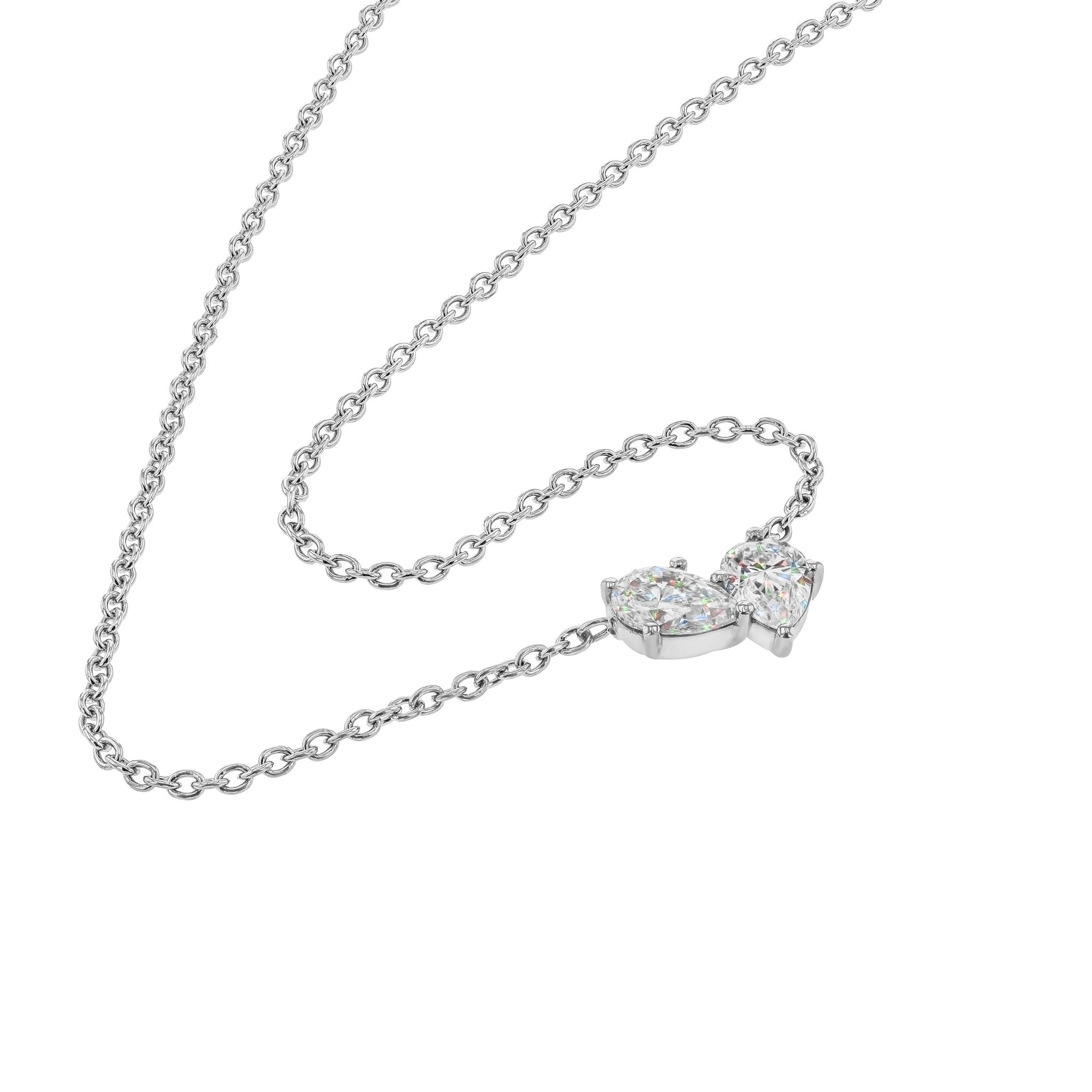 Necklaces-This enchanting heart shaped birthstone necklace looks like a spark of celestial beauty. Two individual, sparkling pear-shaped stones, customizable to each of your beloved's birth months. Luxe Necklace - Features 6x4 Pear Cut Gemstones (total carat weigh 1.00ct) JANUARY Garnet FEBRUARY Amethyst MARCH Aquamarine APRIL Diamond MAY Emerald JUNE Pearl JULY Ruby AUGUST Peridot SEPTEMBER Sapphire OCTOBER Tourmaline NOVEMBER Citrine DECEMBER Blue Topaz Whether worn as a reminder of someone special in you