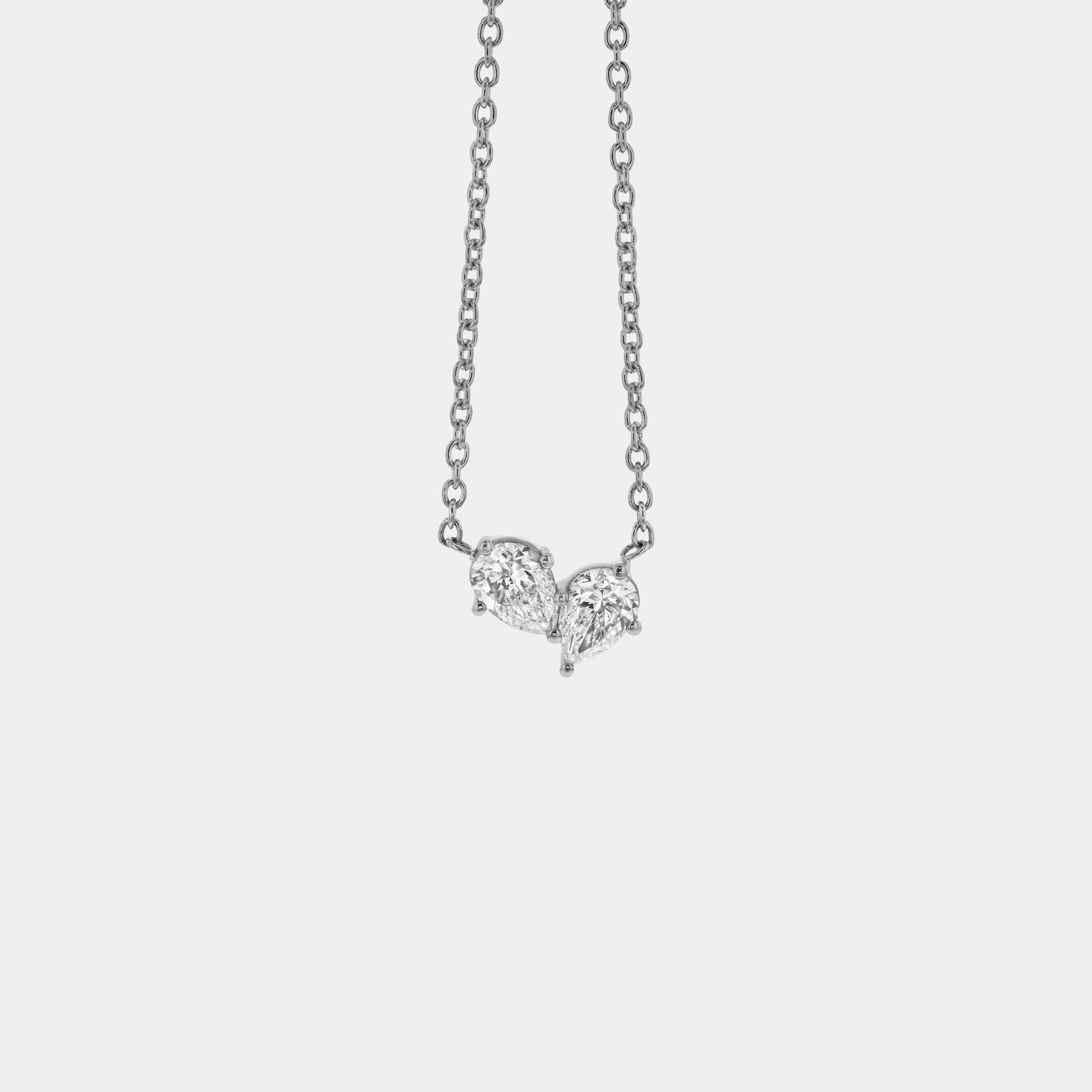 Necklaces-This enchanting heart shaped birthstone necklace looks like a spark of celestial beauty. Two individual, sparkling pear-shaped stones, customizable to each of your beloved's birth months. Luxe Necklace - Features 6x4 Pear Cut Gemstones (total carat weigh 1.00ct) JANUARY Garnet FEBRUARY Amethyst MARCH Aquamarine APRIL Diamond MAY Emerald JUNE Pearl JULY Ruby AUGUST Peridot SEPTEMBER Sapphire OCTOBER Tourmaline NOVEMBER Citrine DECEMBER Blue Topaz Whether worn as a reminder of someone special in you