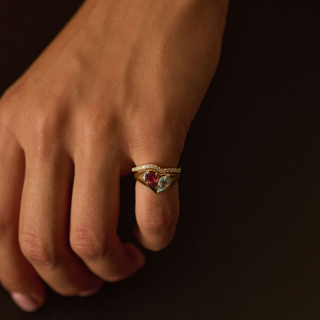 Necklaces-This enchanting heart shaped birthstone necklace looks like a spark of celestial beauty. Two individual, sparkling pear-shaped stones, customizable to each of your beloved's birth months. Other Half Signet Ring- Features 6x4 Pear Cut Gemstones (total carat weigh 1.00ct) JANUARY Garnet FEBRUARY Amethyst MARCH Aquamarine APRIL Diamond MAY Emerald JUNE Pearl JULY Ruby AUGUST Peridot SEPTEMBER Sapphire OCTOBER Tourmaline NOVEMBER Citrine DECEMBER Blue Topaz Whether worn as a reminder of someone specia