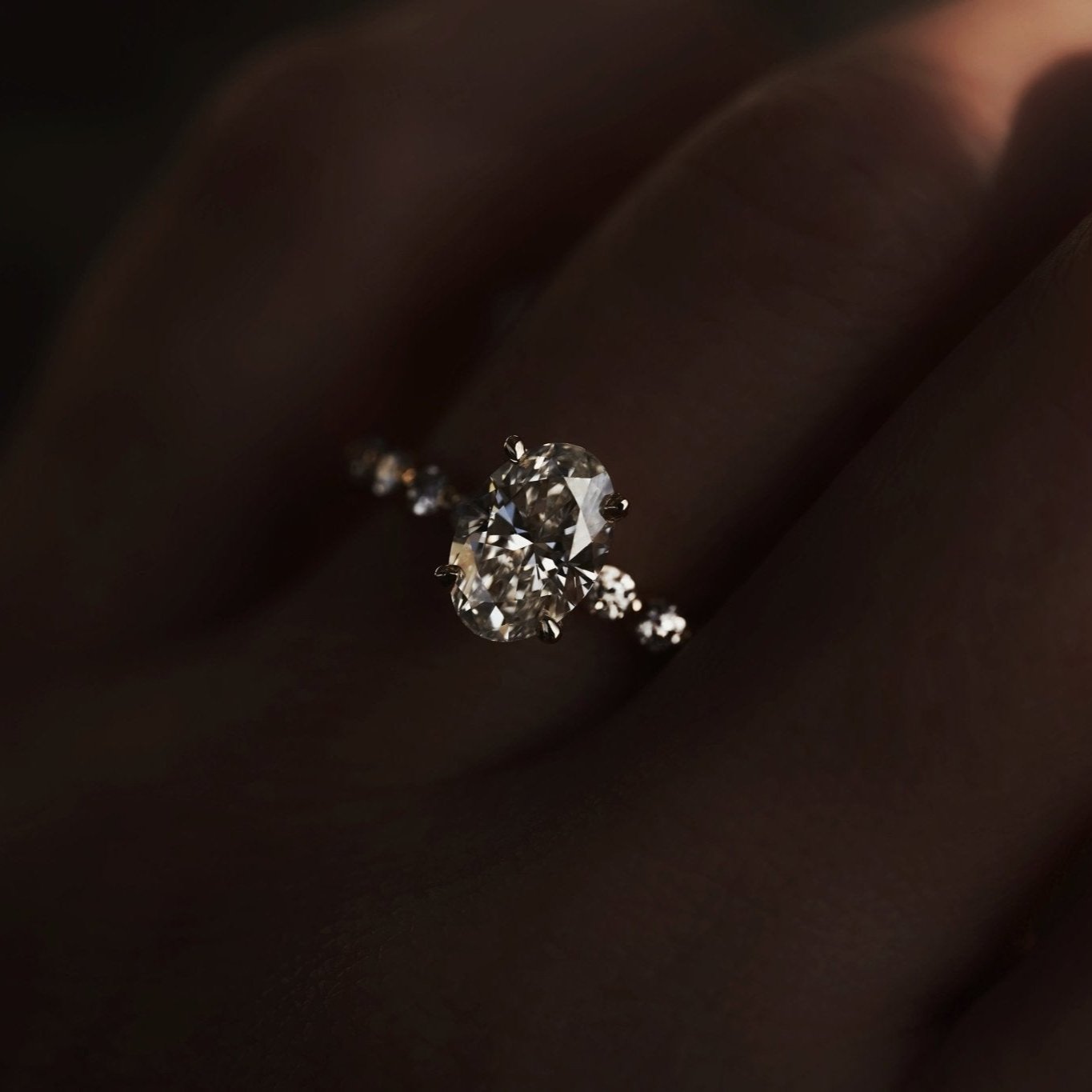 Rings-Exemplify the beauty of the oval cut diamond with the beautiful round brilliant cut diamonds set into the band of this ring. A truly stunning ring to love for a lifetime. Pair with the Petite Josephine or Josephine Luxe for a matching wedding set.-ELIISE MAAR JEWELLERY