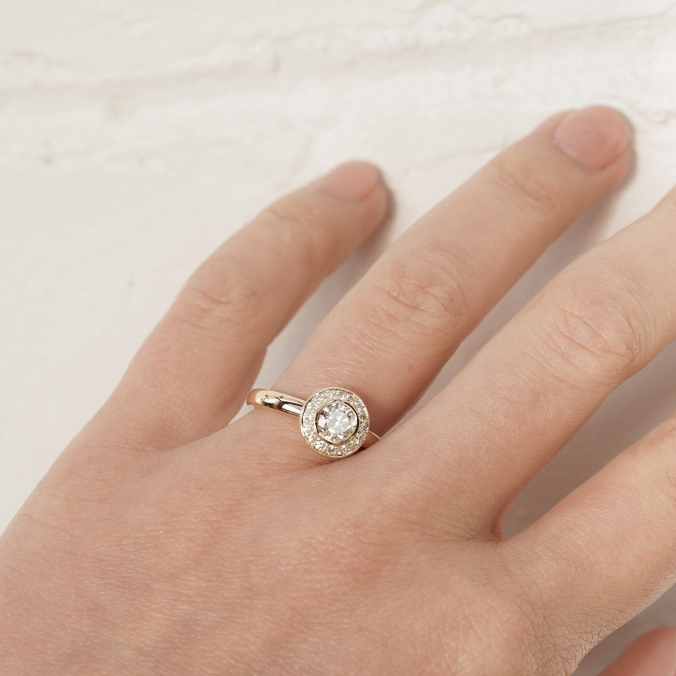 Rings-A classic bezel set round diamond engagement ring with halo.-ELIISE MAAR JEWELLERY