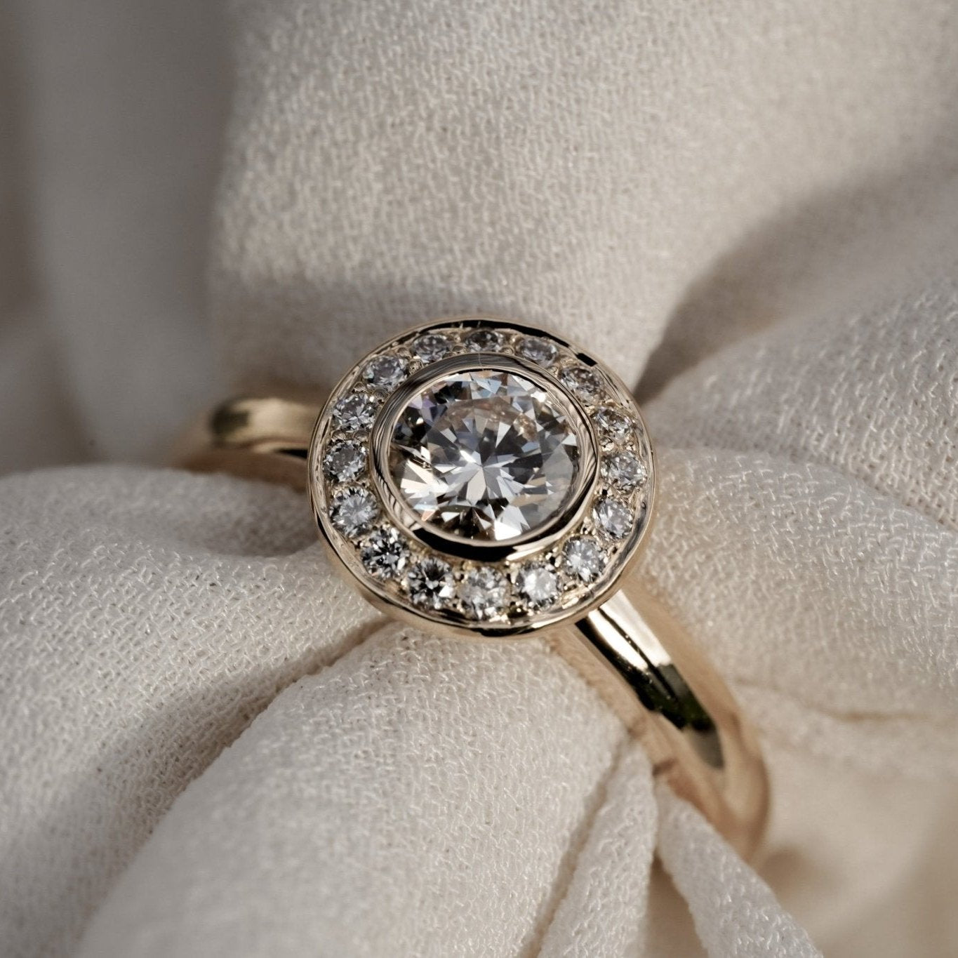 Rings-A classic bezel set round diamond engagement ring with halo.-ELIISE MAAR JEWELLERY