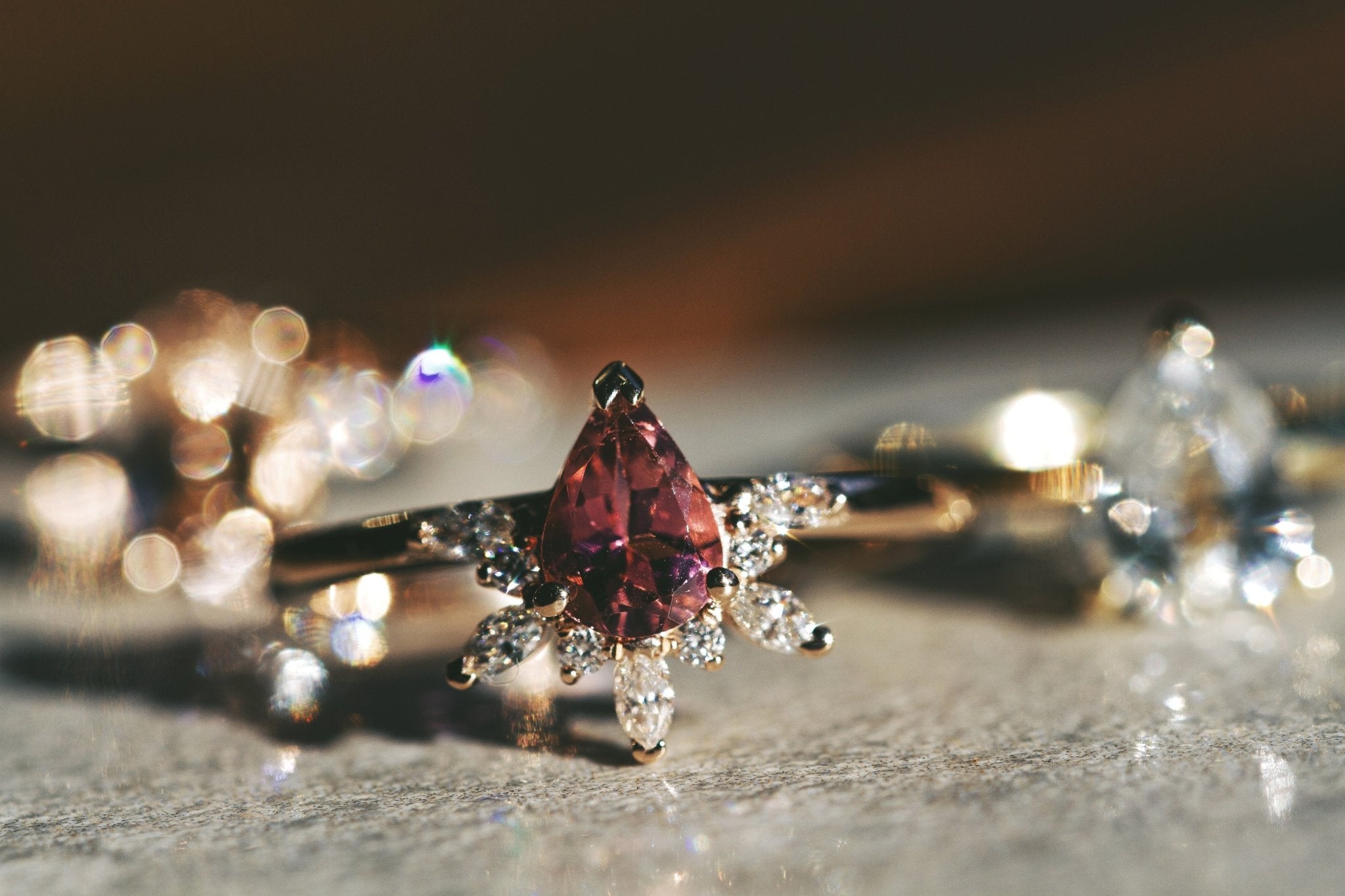 Rings-Feminine, nostalgic nod to the beauty, timelessness and grace of what it means to be woman. Center stone is a stunning vibrant Pink Tourmaline completed with a divine diamond halo. Destined to be your forever obsession. Product Details - Features a 0.70ct Pink Tourmaline- Half halo features marquise and round F/SI1 natural diamonds (approximately 0.20ct)- Shop the Natasha Diamond Crown to complete the set- The ring is 1.85mm wide and 1.6mm thick-ELIISE MAAR JEWELLERY