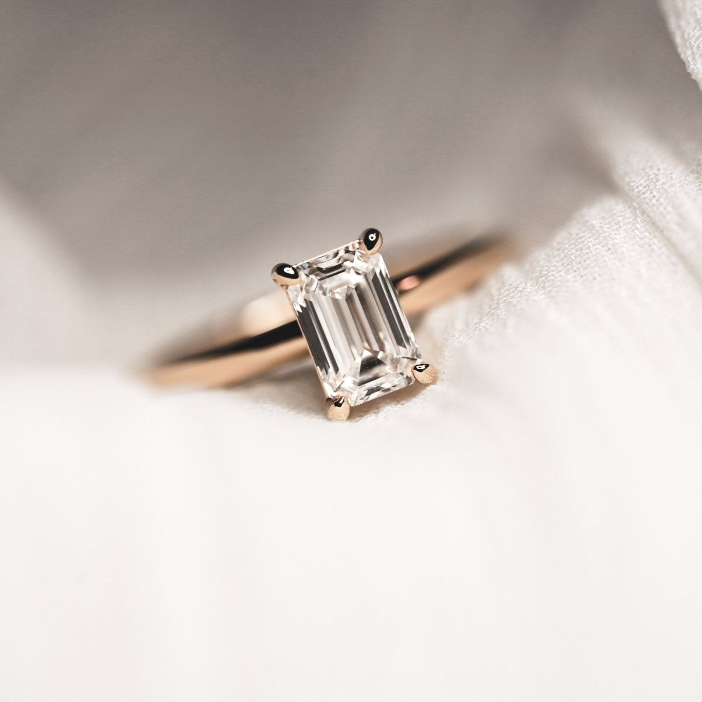 Rings-A classic solitaire featuring an emerald cut diamond. Available in various diamond sizes.-ELIISE MAAR JEWELLERY