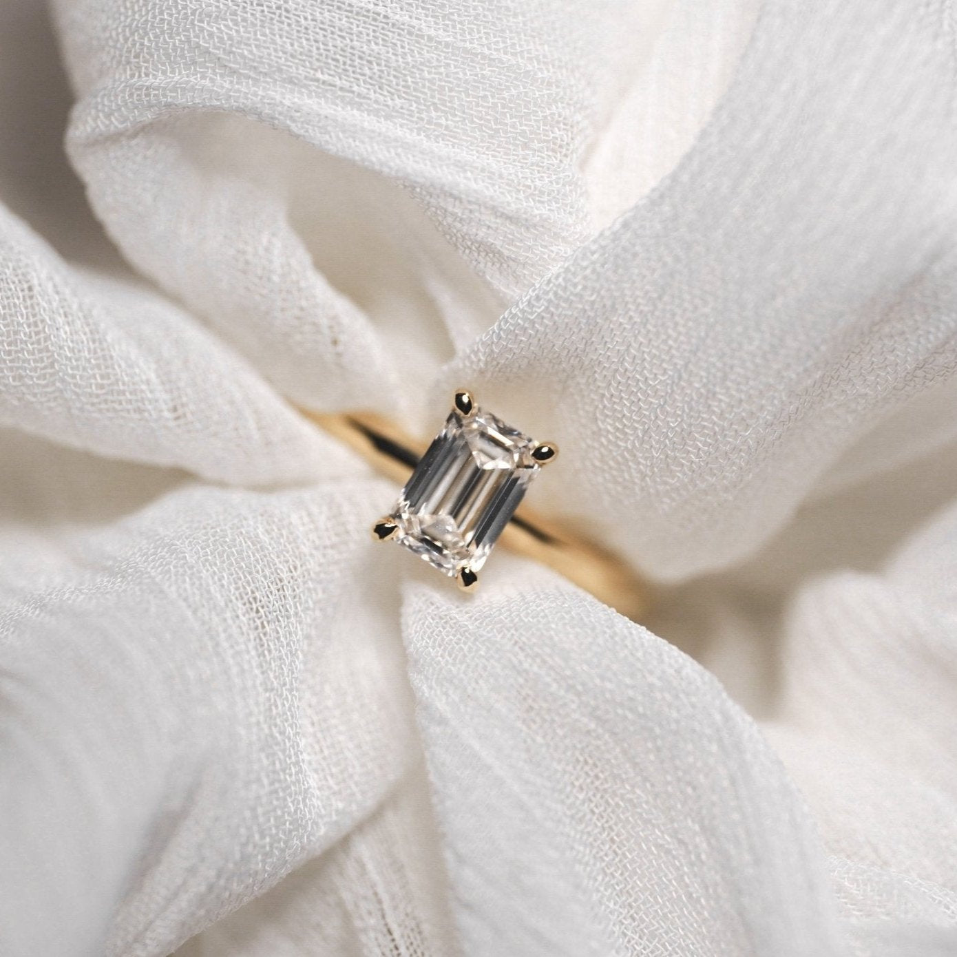 Rings-A classic solitaire featuring an emerald cut diamond. Available in various diamond sizes.-ELIISE MAAR JEWELLERY