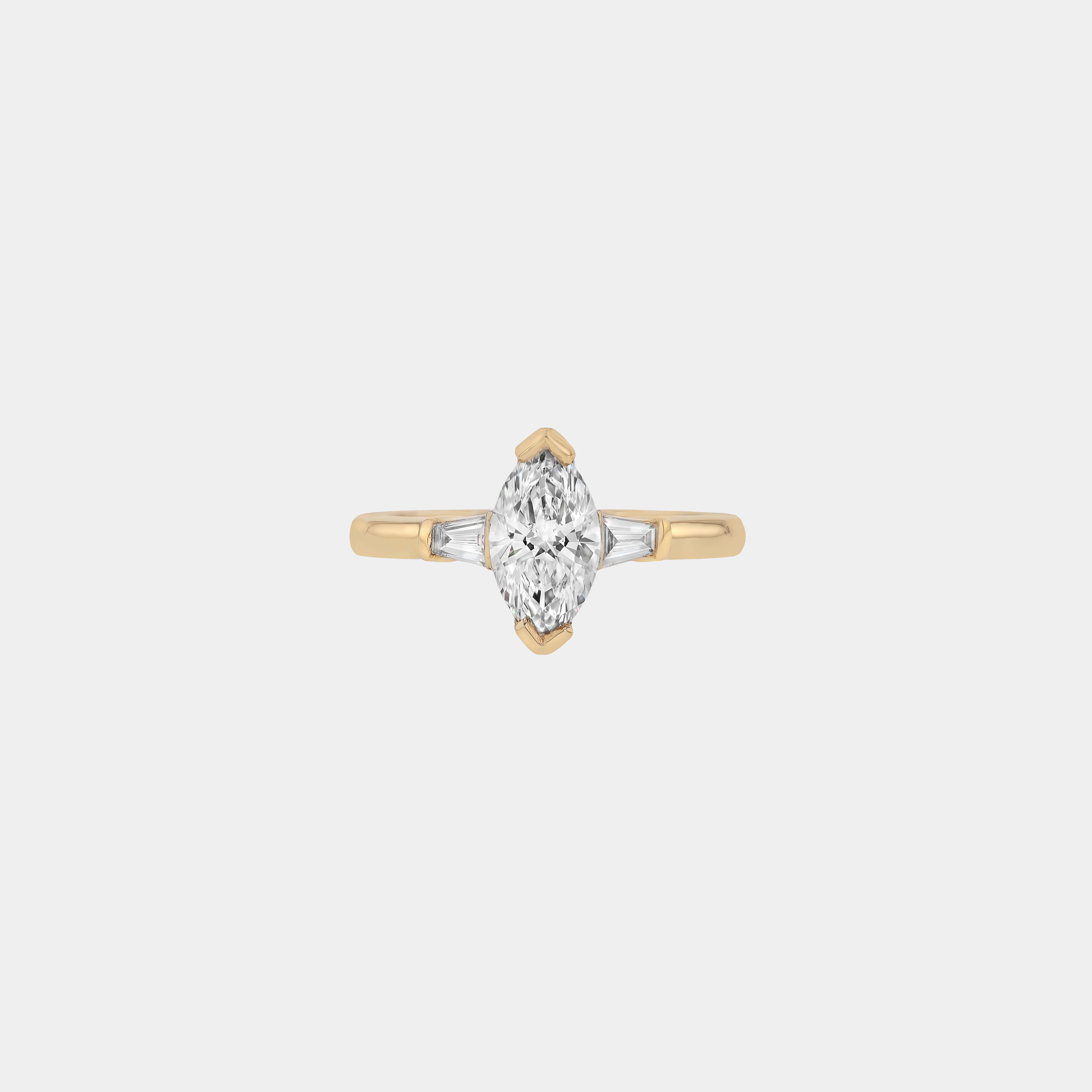 Rings-Your perfect art-deco dream. The striking beauty of the marquise diamond is the focus of this stunning engagement ring. The trilogy arrangement with the tapered baguettes on either side of the centre stone creates a crescendo of sparkling beauty. - VIDEO 1- VIDEO 2-ELIISE MAAR JEWELLERY