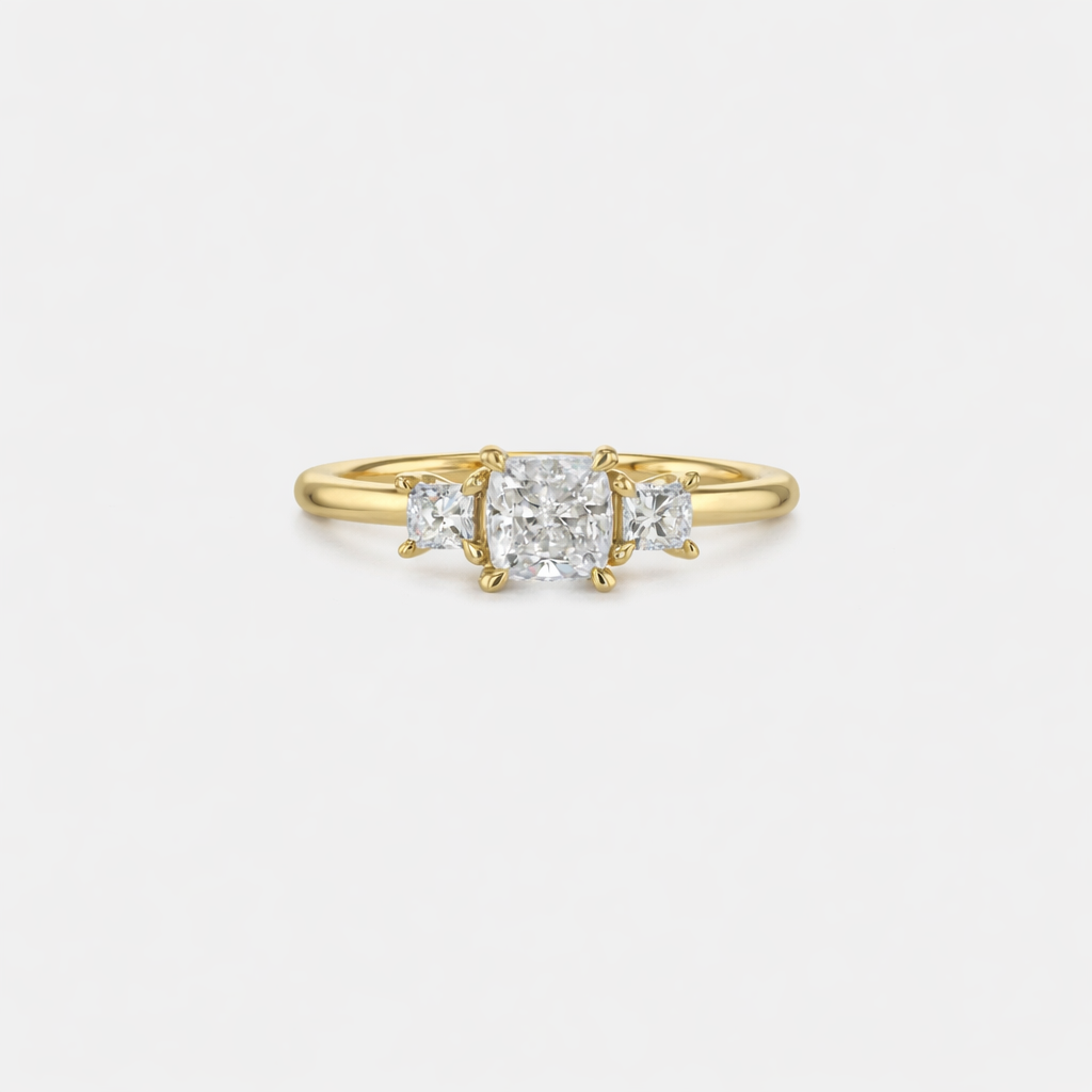 Rings-This elegant trilogy features a cushion cut centre diamond with a brilliant princess cut 0.30ct diamond on either side. VIDEO-ELIISE MAAR JEWELLERY