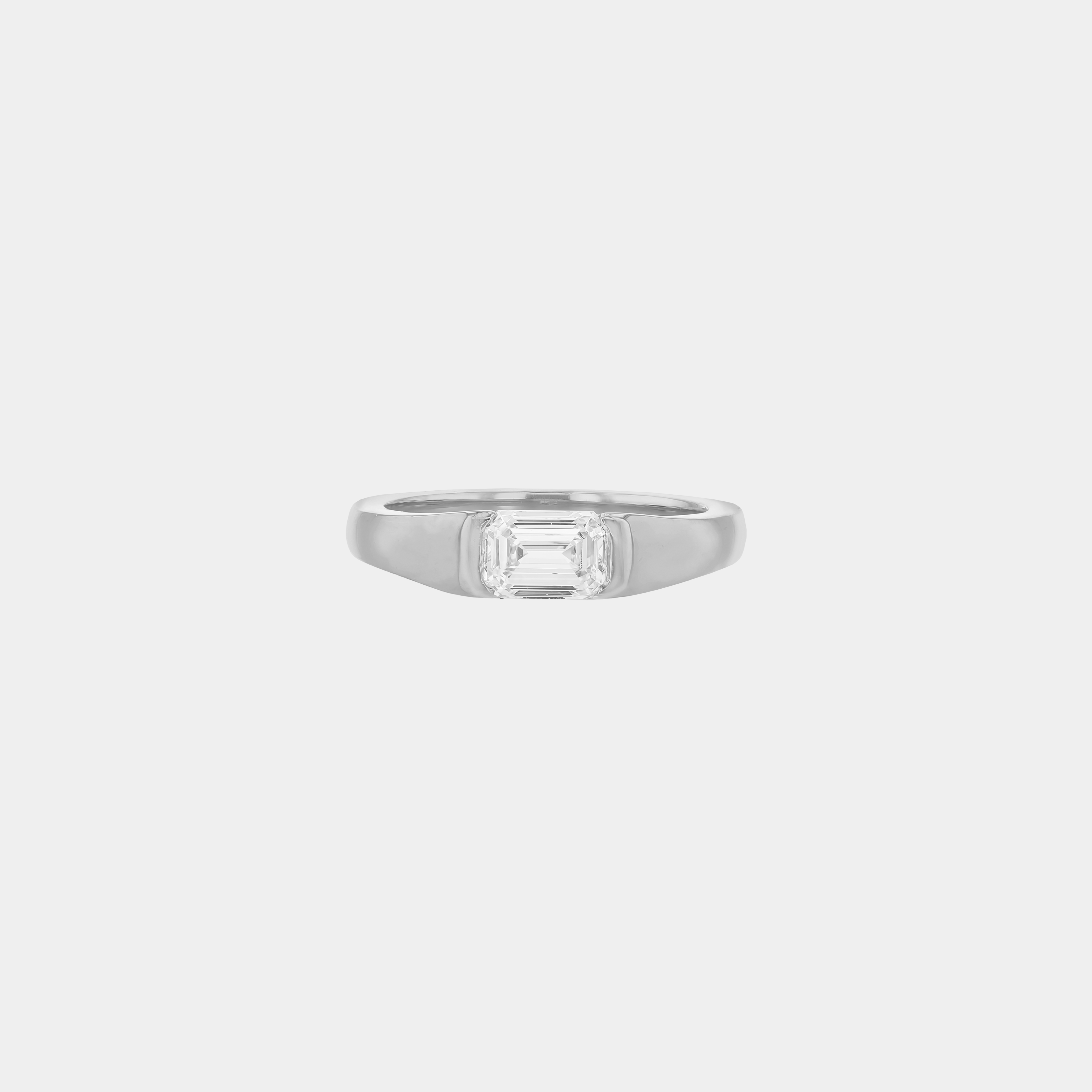 Rings-A modern and elegant signet band. Featuring an east-west half bezel set emerald cut diamond. This ring is the perfect understated engagement ring or striking signet band. Pair with the Petite Nadia Diamond Band for an elevated wedding set.-ELIISE MAAR JEWELLERY