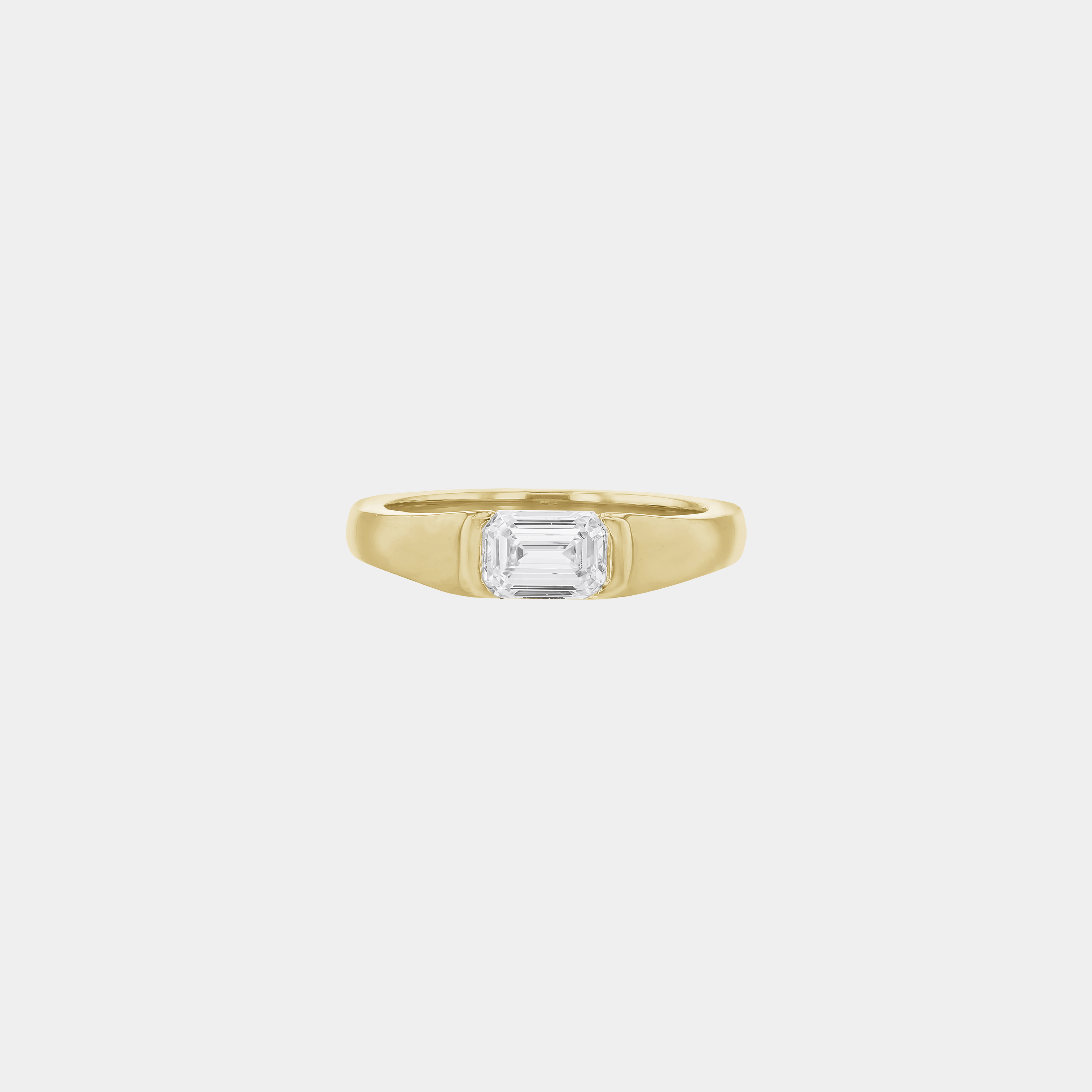 Rings-A modern and elegant signet band. Featuring an east-west half bezel set emerald cut diamond. This ring is the perfect understated engagement ring or striking signet band. Pair with the Petite Nadia Diamond Band for an elevated wedding set.-ELIISE MAAR JEWELLERY