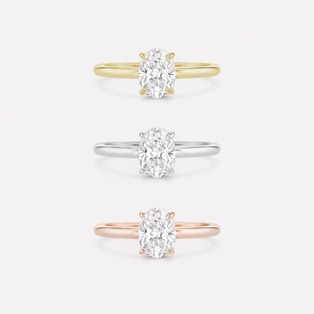 Rings-Drawing inspiration from Grace Kelly, this solitaire ring embodies timeless elegance. Featuring a 4-claw setting and a smoothly rounded band, it offers a subtle frame that highlights the radiant oval diamond at its center. An ideal engagement ring, it complements any wedding band to form a distinctive and personalized set. Shown paired with the 4.0mm Ceremonial Square Band and the Eleanor Luxe Diamond Band.-ELIISE MAAR JEWELLERY