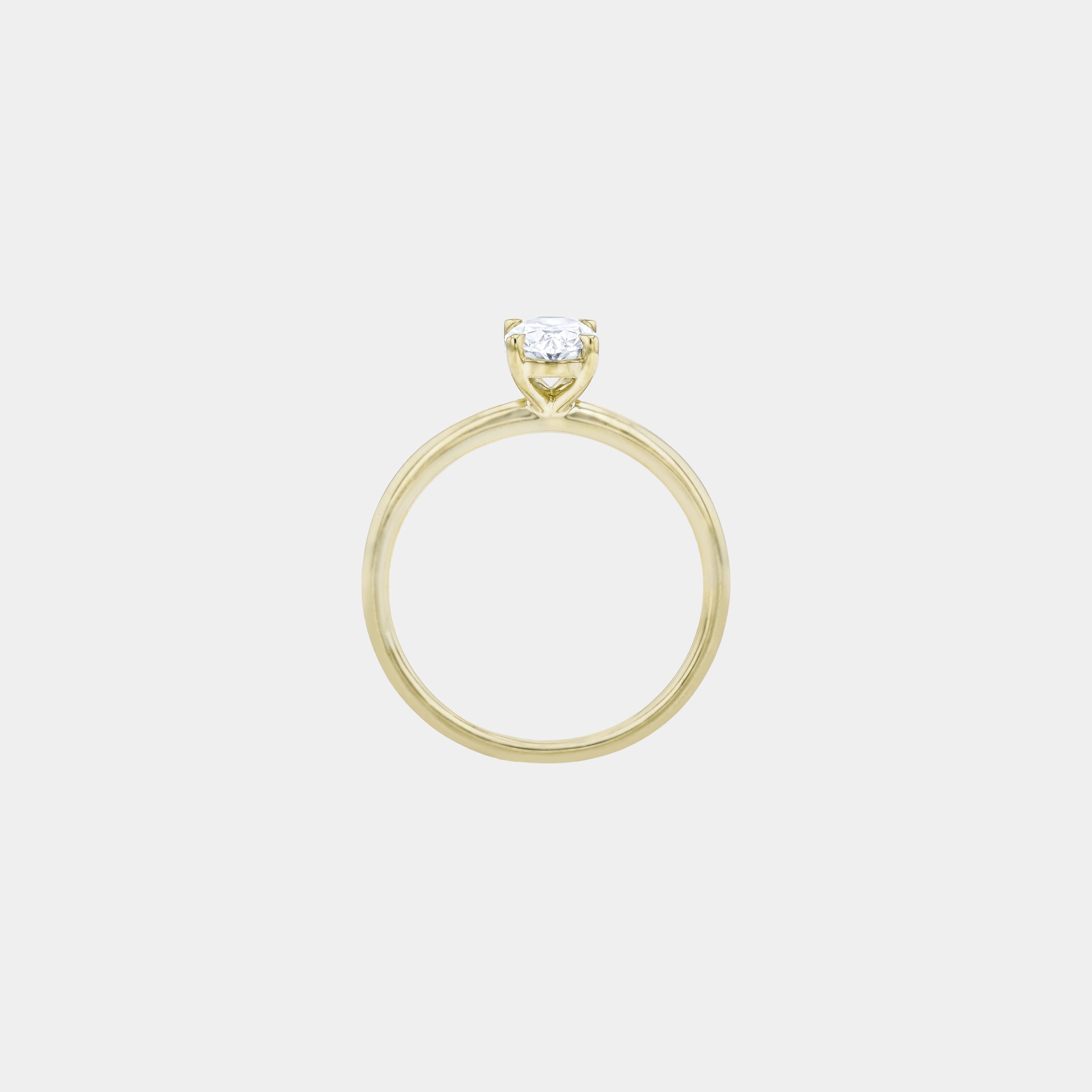 Rings-Drawing inspiration from Grace Kelly, this solitaire ring embodies timeless elegance. Featuring a 4-claw setting and a smoothly rounded band, it offers a subtle frame that highlights the radiant oval diamond at its center. An ideal engagement ring, it complements any wedding band to form a distinctive and personalized set. Shown paired with the 4.0mm Ceremonial Square Band and the Eleanor Luxe Diamond Band.-ELIISE MAAR JEWELLERY