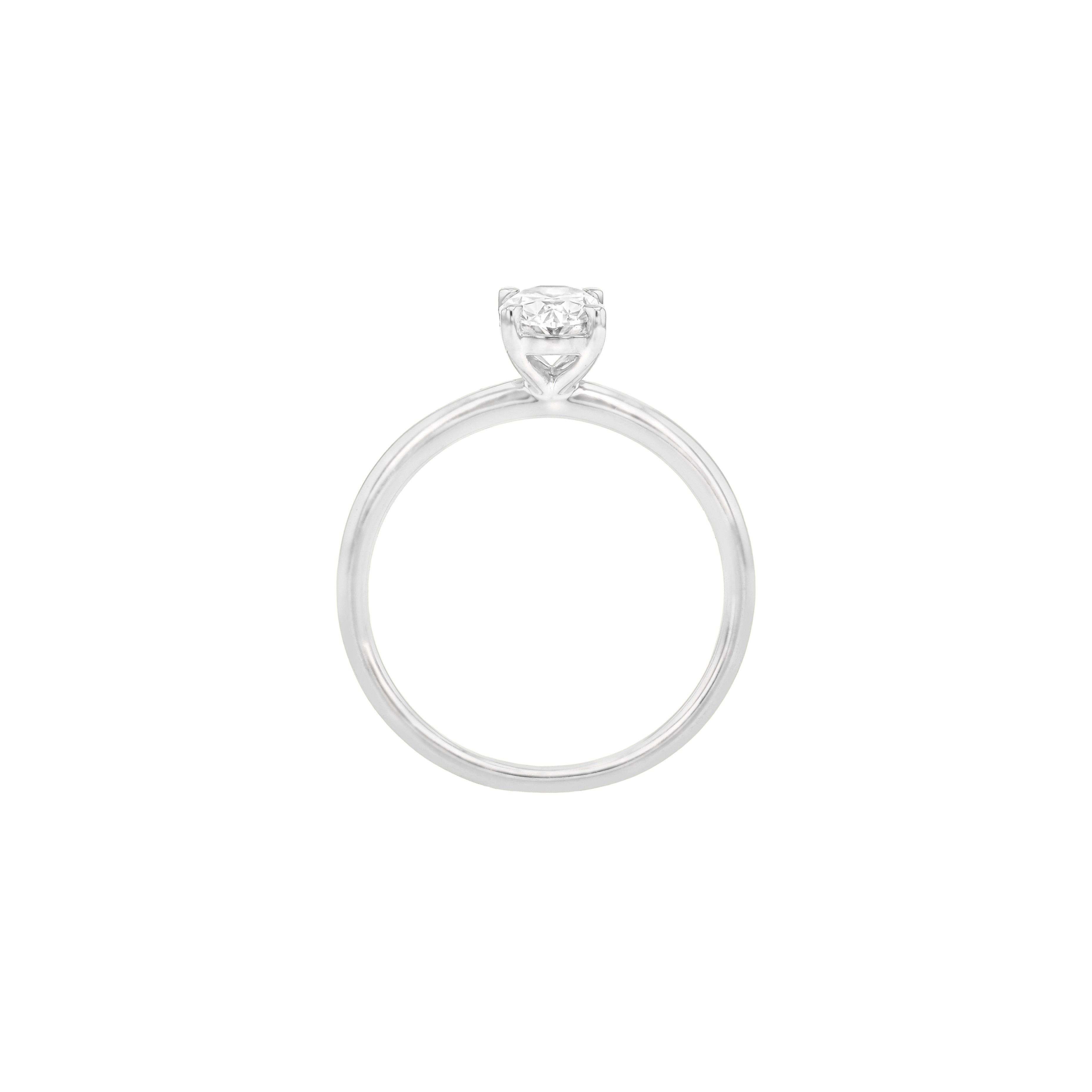 Rings-Drawing inspiration from Grace Kelly, this solitaire ring embodies timeless elegance. Featuring a 4-claw setting and a smoothly rounded band, it offers a subtle frame that highlights the radiant oval diamond at its center. An ideal engagement ring, it complements any wedding band to form a distinctive and personalized set. Shown paired with the 4.0mm Ceremonial Square Band and the Eleanor Luxe Diamond Band.-ELIISE MAAR JEWELLERY