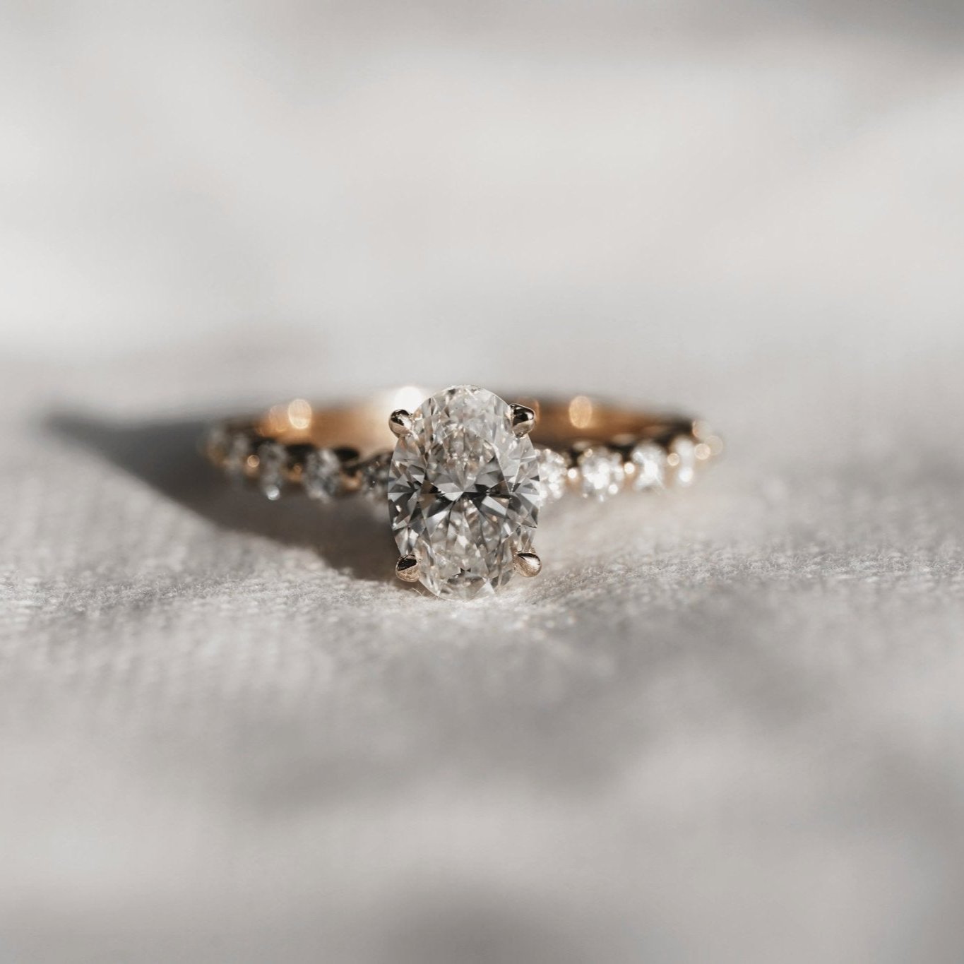 Rings-Exemplify the beauty of the oval cut diamond with the beautiful round brilliant cut diamonds set into the band of this ring. A truly stunning ring to love for a lifetime. Pair with the Petite Josephine or Josephine Luxe for a matching wedding set.-ELIISE MAAR JEWELLERY