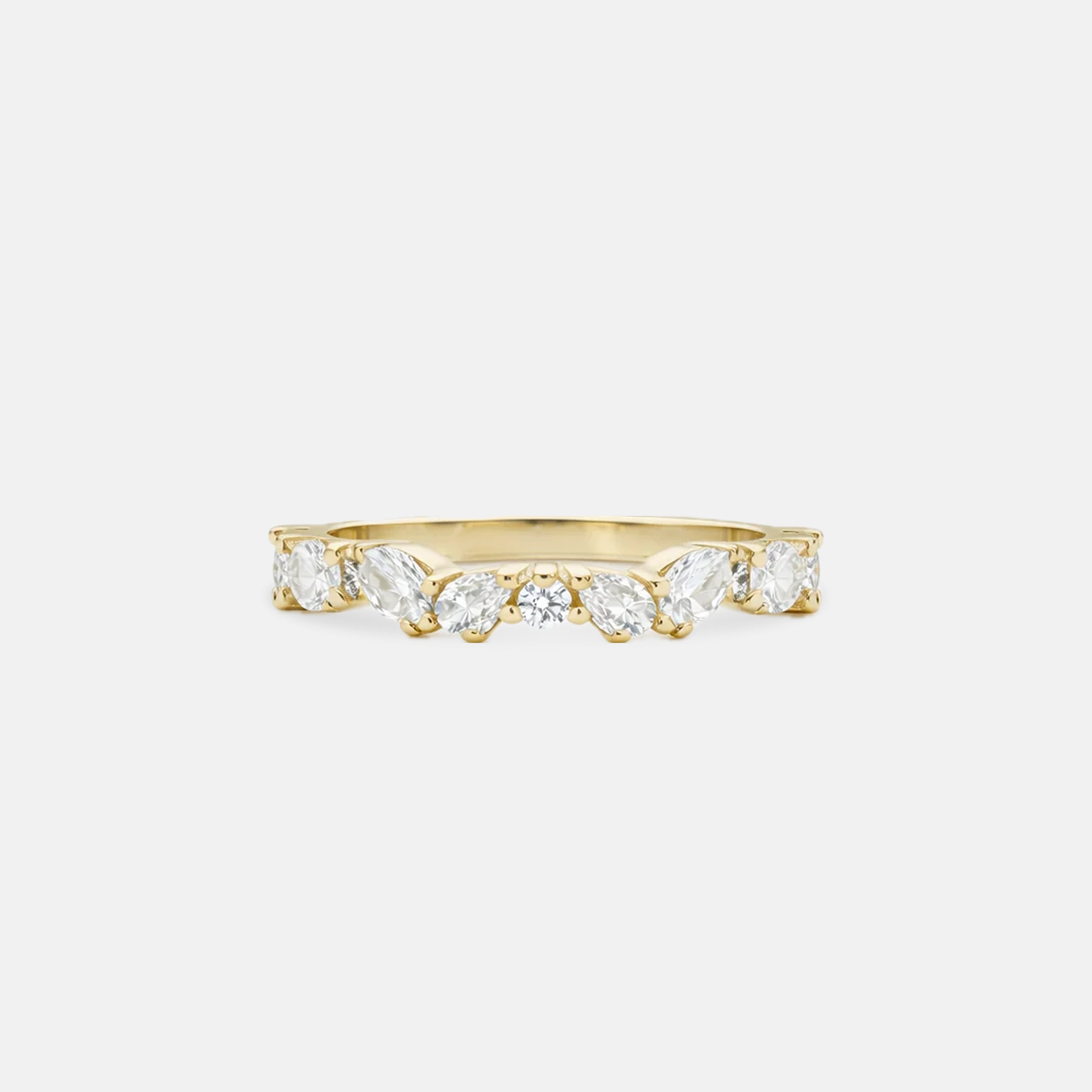 Gold ring with diamonds on a white background