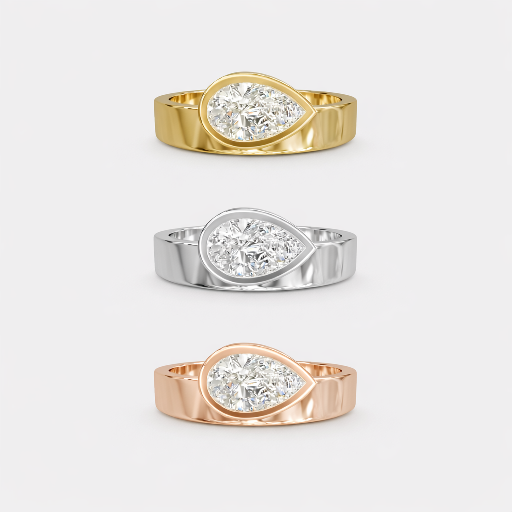 Rings-The Kali draws inspiration from her namesake Hindu goddess of time, change, creation and power. Known as being a defender of innocence Kali is a force to be reckoned with. The striking pear cut stone set in the thick band represents the divine female power that Kali embodies.-ELIISE MAAR JEWELLERY