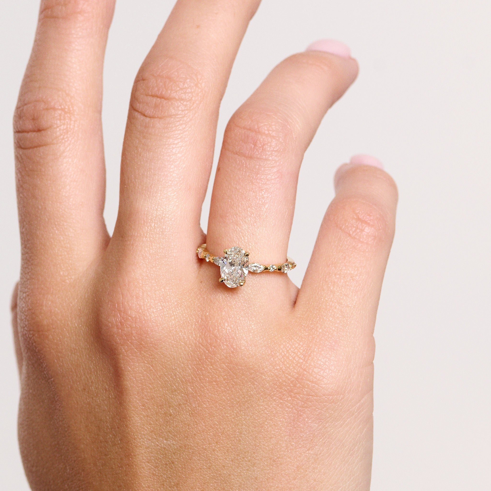 Rings-Our most classic Eliise Maar Design. With striking round brilliant and marquise cut diamonds set into the band in a dazzling wave of brilliance creating a crescendo at the centre stone of your choosing. This ring is feminine and mesmerising.-ELIISE MAAR JEWELLERY