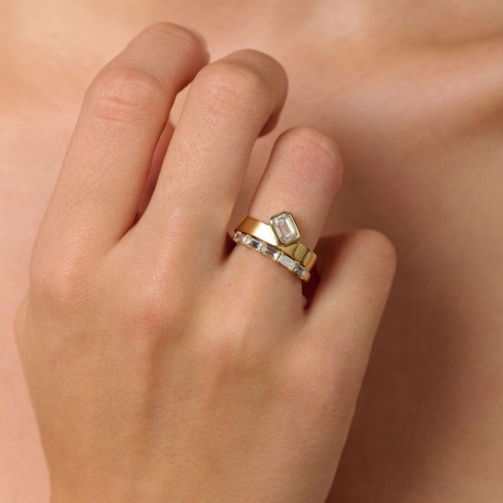 Rings-Part of the Le Courage collection, the Morgan is inspired by the powerful Celtic Goddess of War, Fate and Death who is called on for protection and inspiration. The strong straight windows of the emerald cut stone on the thick gold band pay homage to the courage and strength this mysterious goddess represents.-ELIISE MAAR JEWELLERY