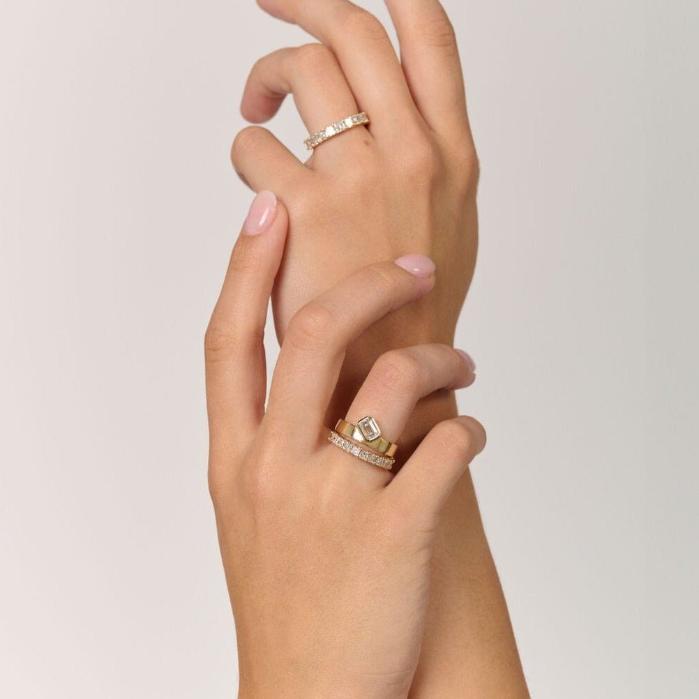 Rings-Part of the Le Courage collection, the Morgan is inspired by the powerful Celtic Goddess of War, Fate and Death who is called on for protection and inspiration. The strong straight windows of the emerald cut stone on the thick gold band pay homage to the courage and strength this mysterious goddess represents.-ELIISE MAAR JEWELLERY