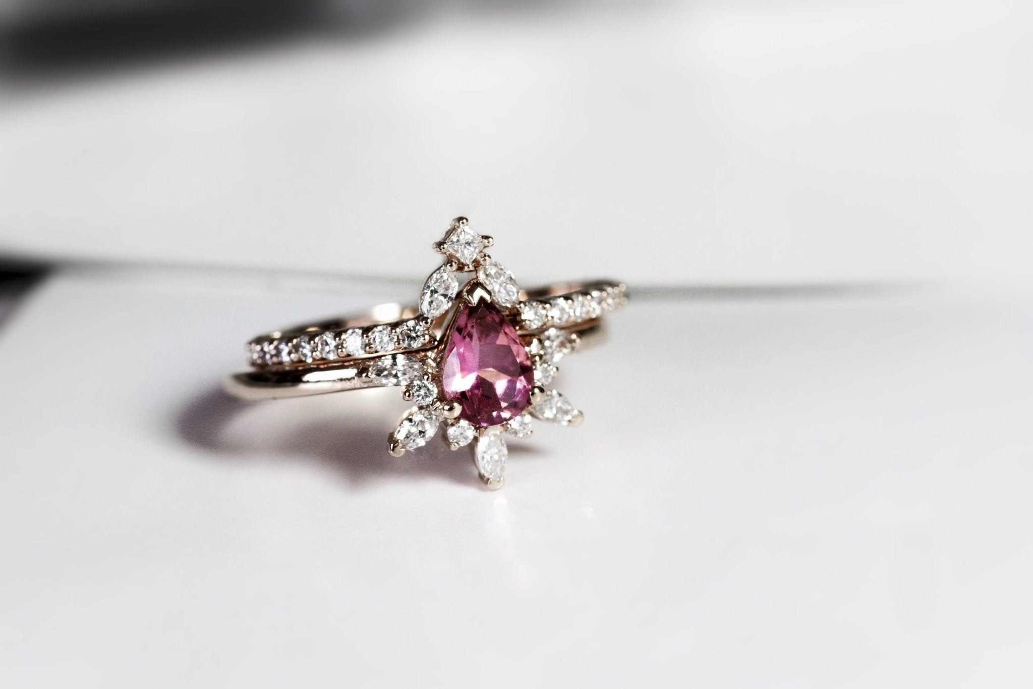 Rings-Feminine, nostalgic nod to the beauty, timelessness and grace of what it means to be woman. Center stone is a stunning vibrant Pink Tourmaline completed with a divine diamond halo. Destined to be your forever obsession. Product Details - Features a 0.70ct Pink Tourmaline- Half halo features marquise and round F/SI1 natural diamonds (approximately 0.20ct)- Shop the Natasha Diamond Crown to complete the set- The ring is 1.85mm wide and 1.6mm thick-ELIISE MAAR JEWELLERY