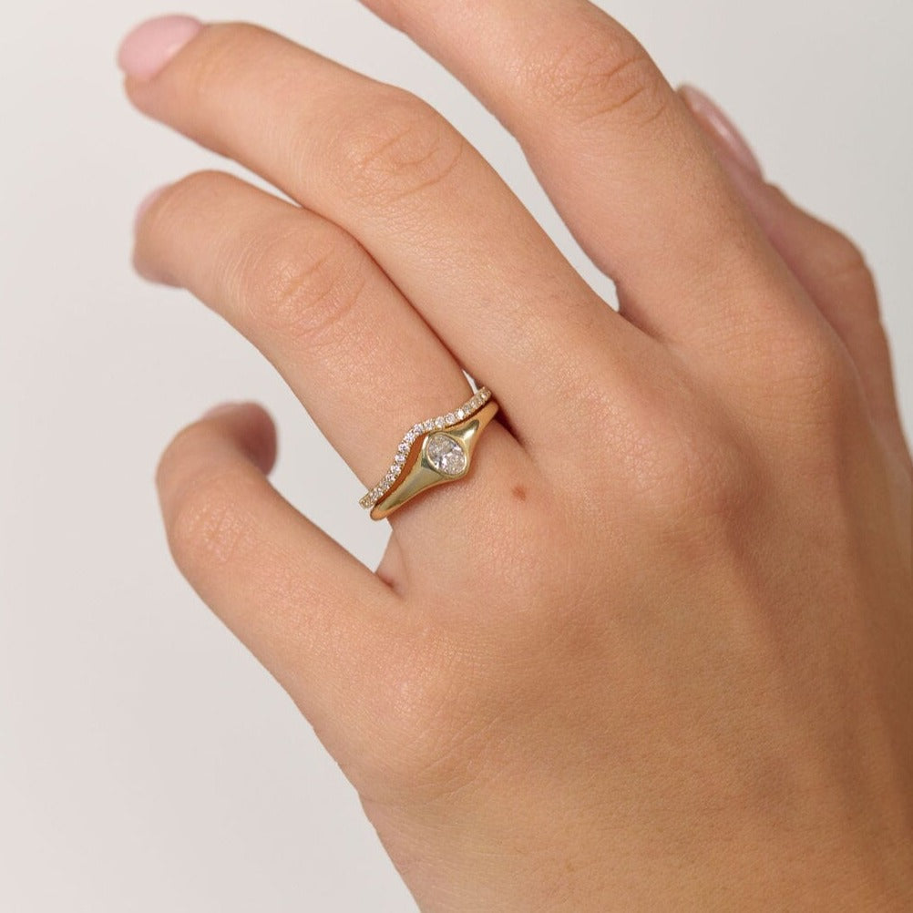 Rings-An exquisitely dainty signet band. Set with an oval diamond, this signet is perfect as a pinky ring or tasteful ring on any finger. Stunning by itself or paired with the Staple Signet Diamond Band for extra elegance. Matching Staple Signet diamond band is available to purchase separately here-ELIISE MAAR JEWELLERY