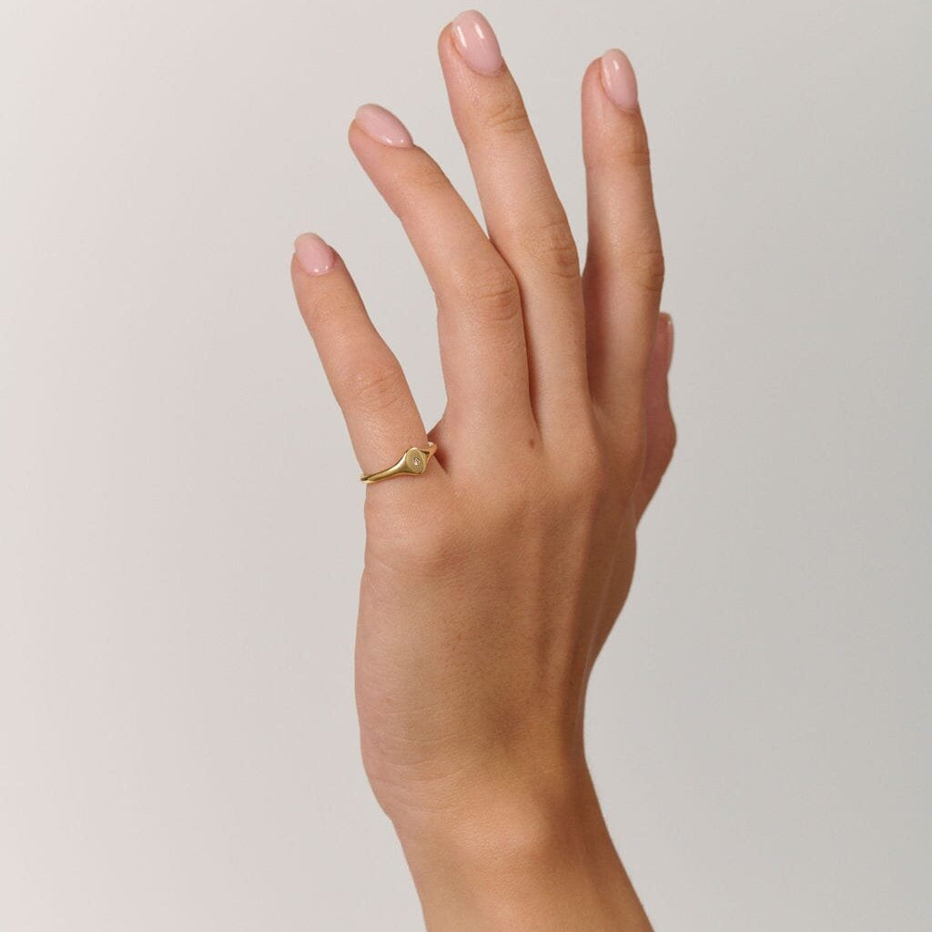 Rings-An exquisitely dainty signet band. Set with a rare pink diamond, this signet is perfect as a pinky ring or delicate band on any finger. Stunning by itself or paired with the staple signet diamond band for extra radiance.-ELIISE MAAR JEWELLERY